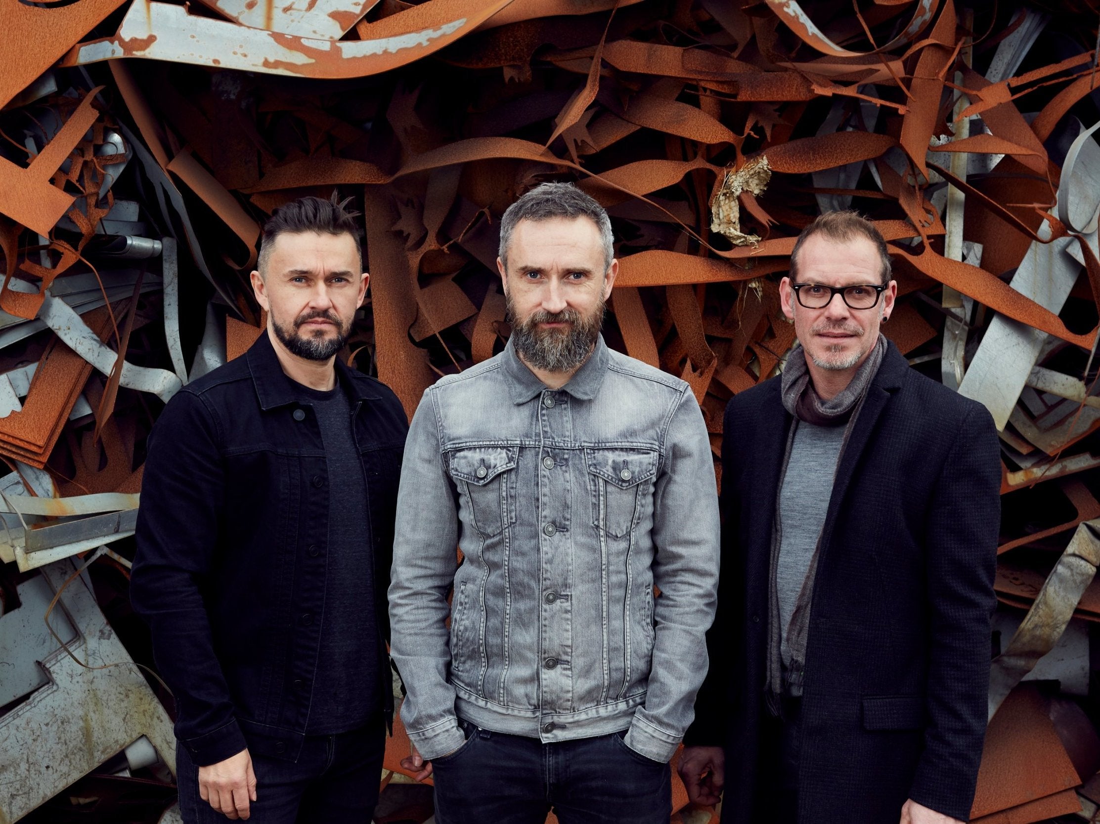 (L-R) bassist Mike Hogan, guitarist Noel Hogan and drummer Fergal Lawler