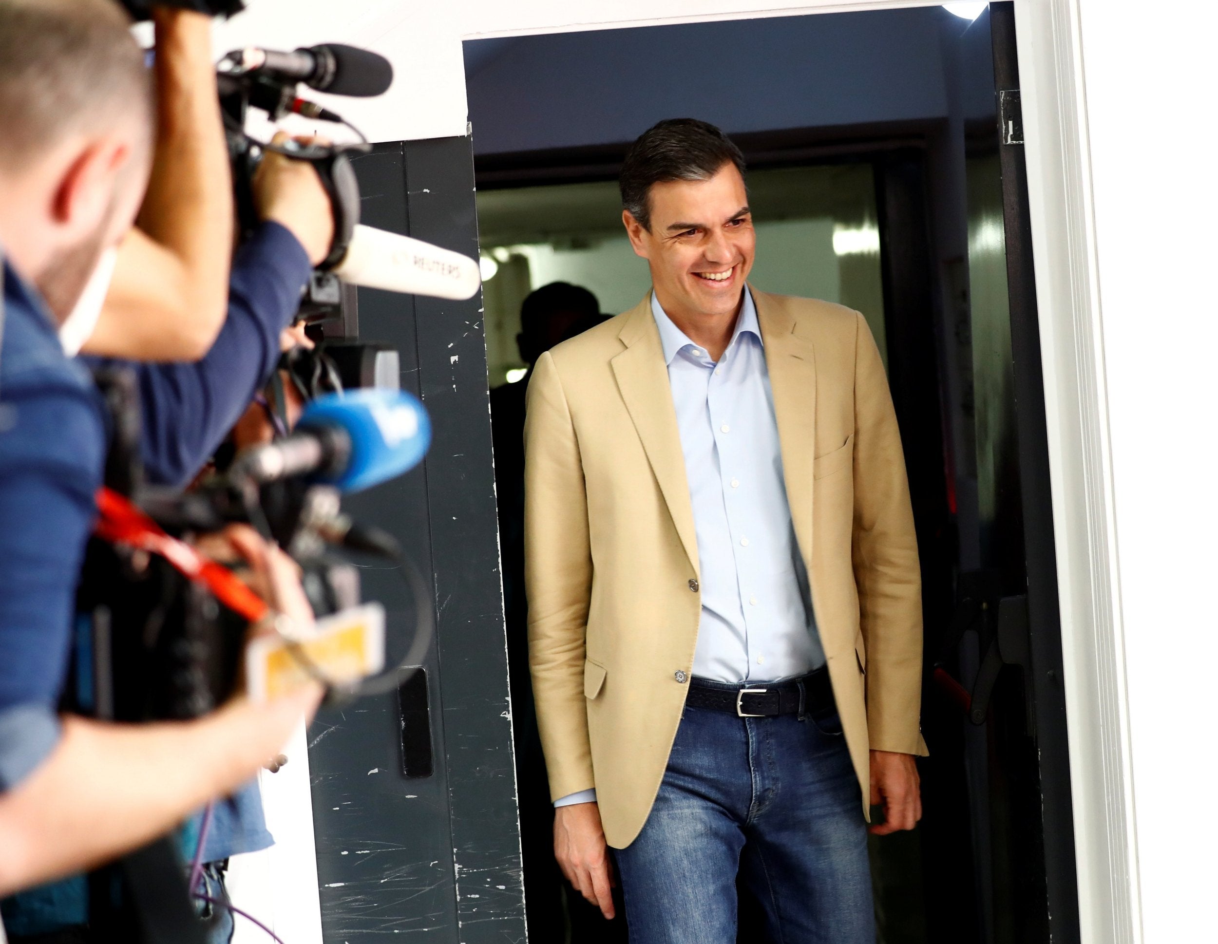 Spain's acting Prime Minister Pedro Sanchez arrives at a party meeting a day after Spain's general election, at PSOE headquarters in Madrid