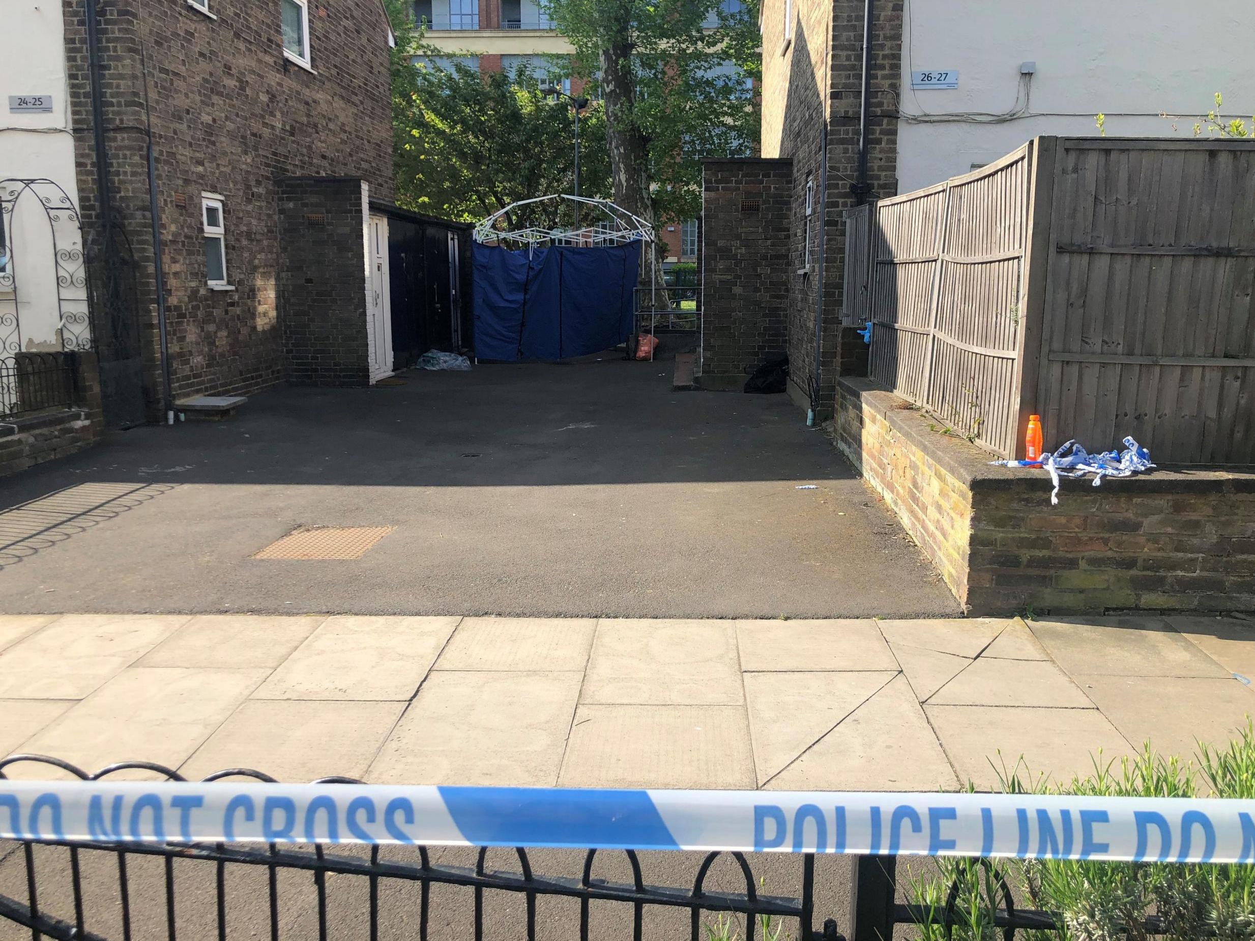 The scene at Somerford Grove in Hackney, east London, where a boy believed to be 15 years old has been stabbed to death