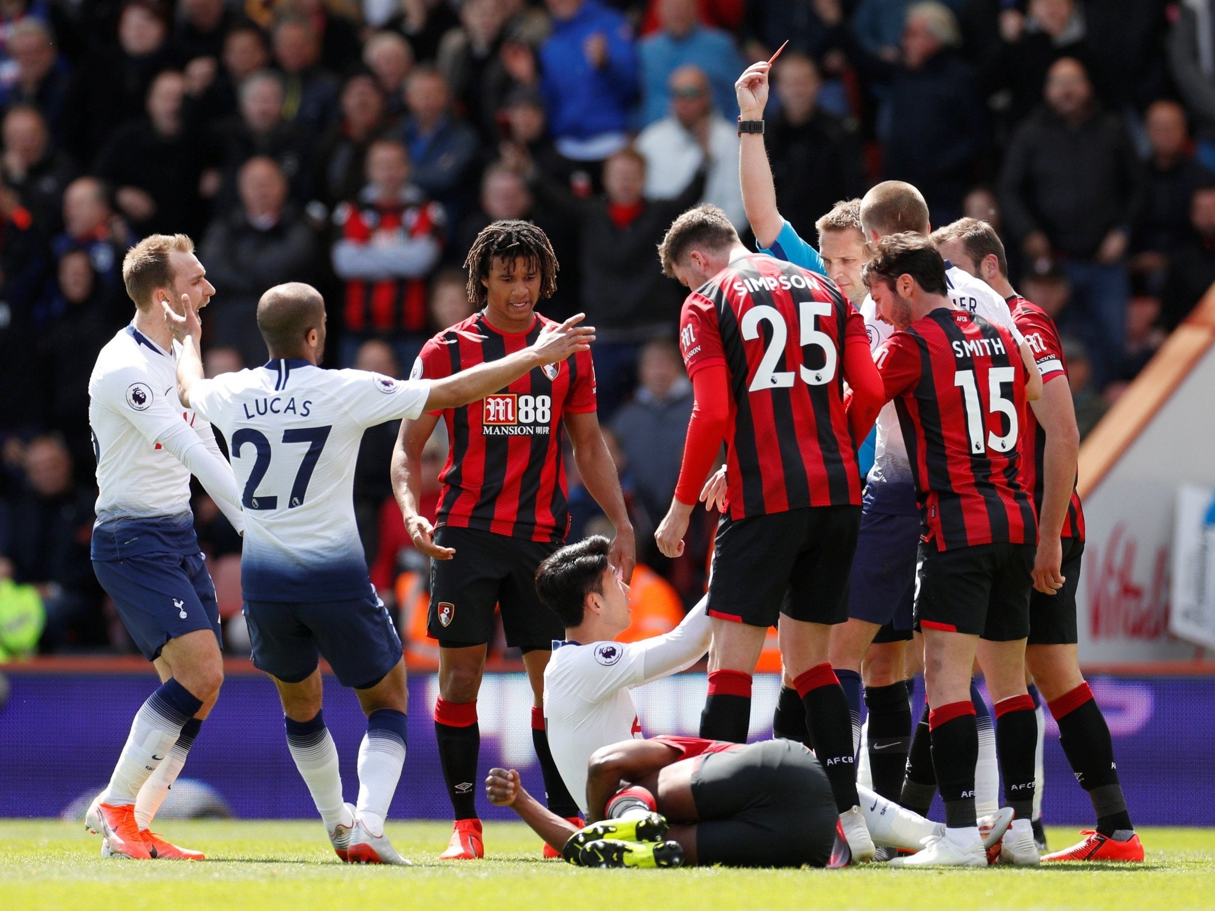 Tottenham's Son Heung-min is shown a red card