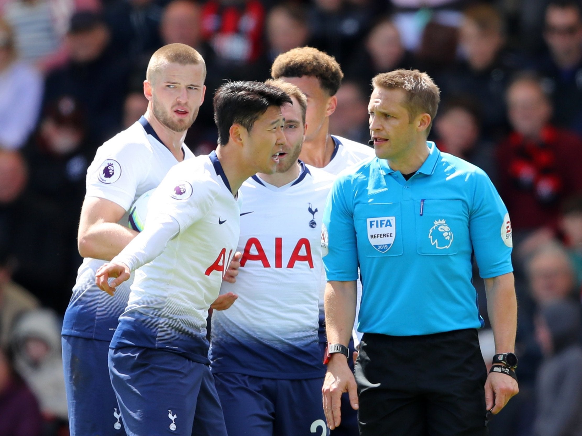 Son Heung-min confronts referee Craig Pawson after being sent off (Getty)