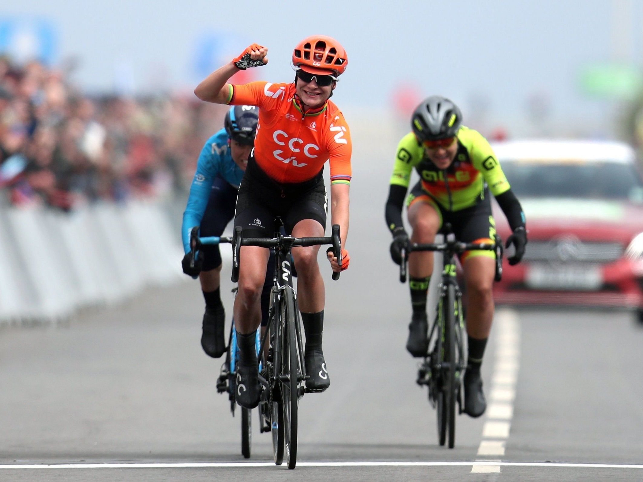 Marianne Vos celebrates as she crosses the finish line on stage two to win the Tour de Yorkshire