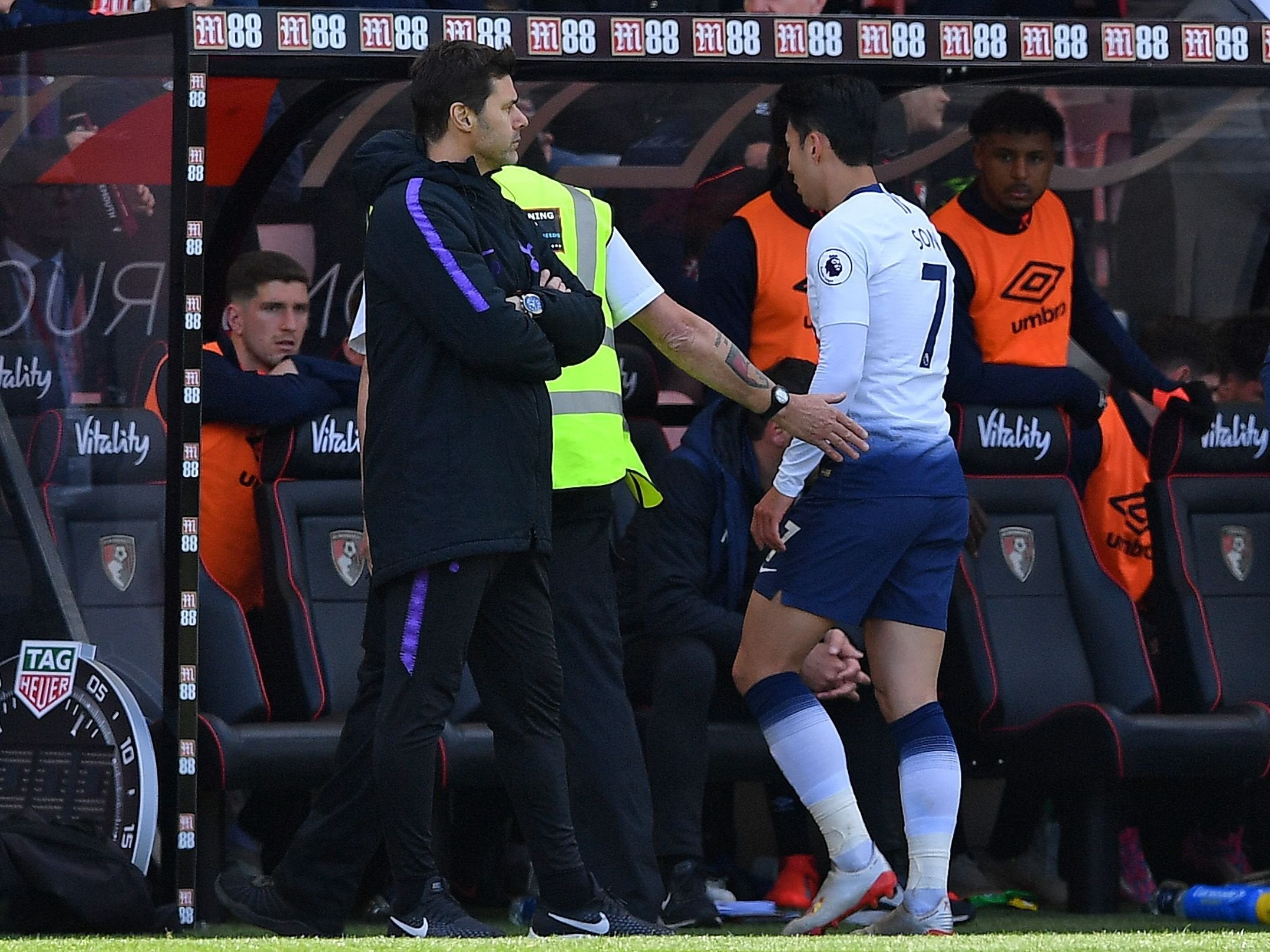 Pochettino looks on after Son is sent off for Spurs