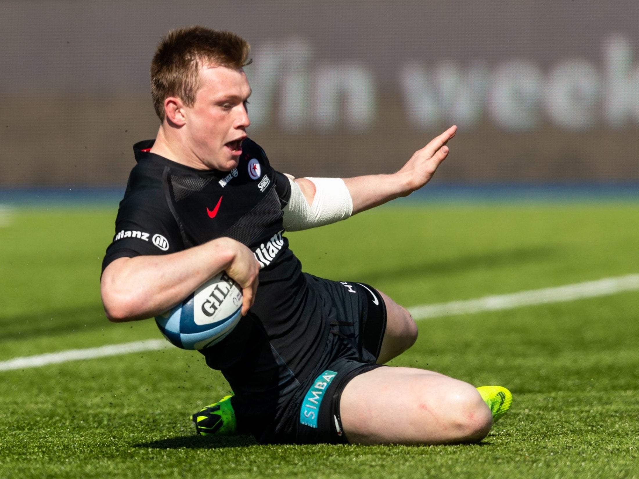 Nick Tompkins scores one of Saracens' six tries in the victory over Exeter Chiefs