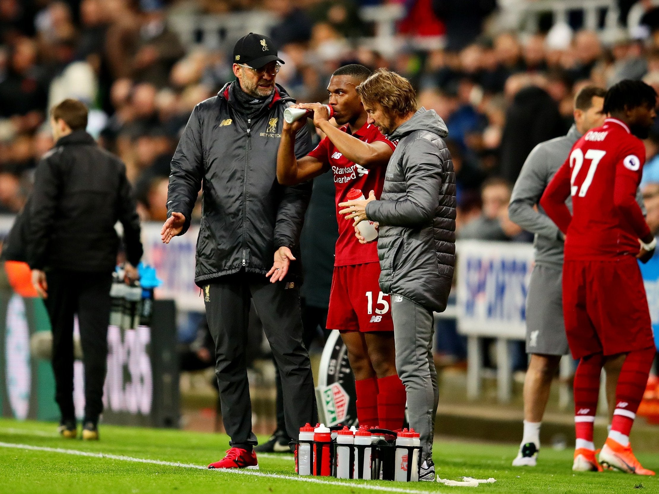 Sturridge receives advice from Klopp on the touchline