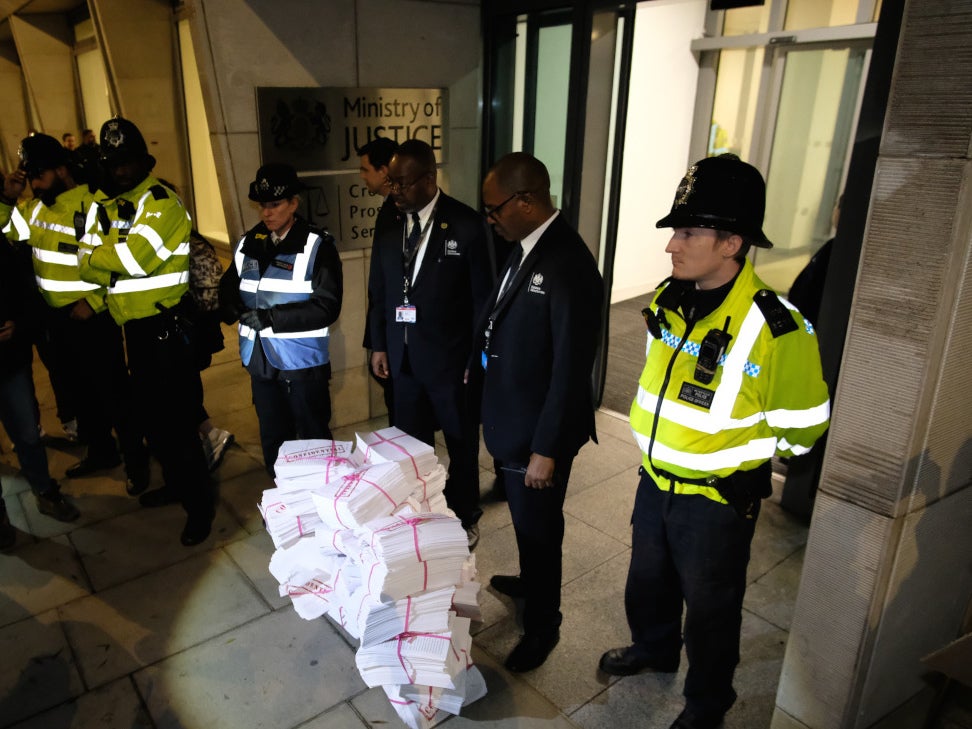 Protesters dumped documents representing rape victims’ phone data outside the CPS’s offices in November