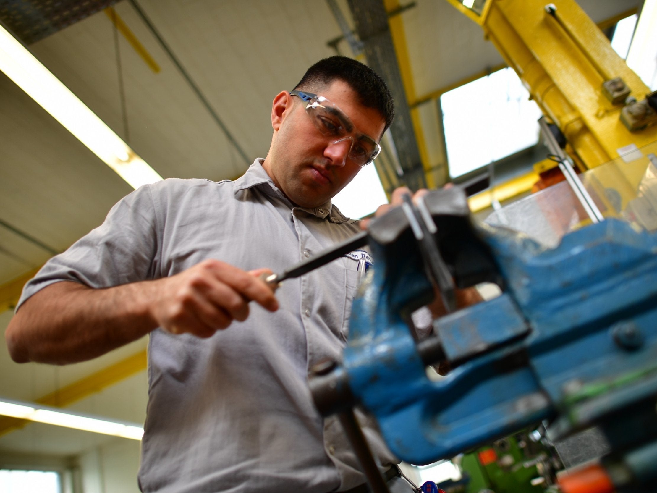 Alan Ramadan, a refugee from Syria who came to Germany in 2012, attends a job training programme as an industrial mechanic in Hanover