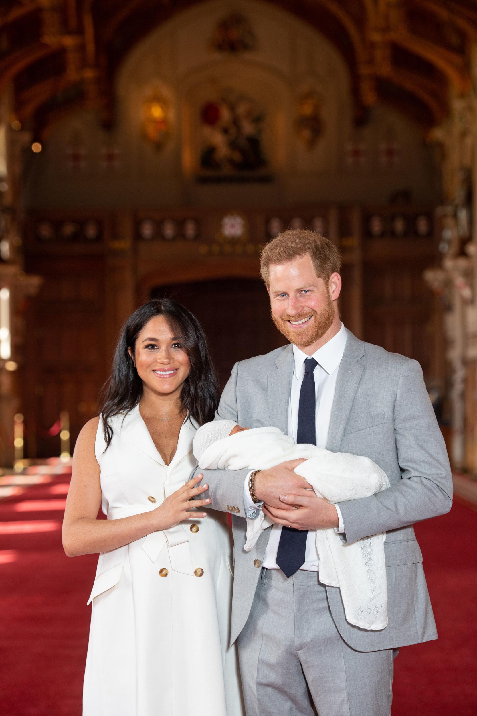 The Duke and Duchess of Sussex with their baby son, who was born on Monday morning, during a photocall in St George's Hall at Windsor Castle in Berkshire. (PA_Images)