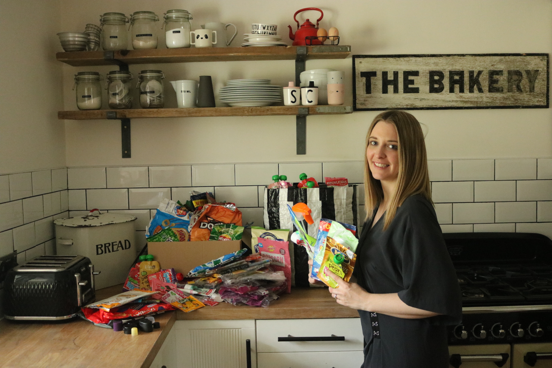 Olivia McGuinness and just a few of the wrappers she has collected