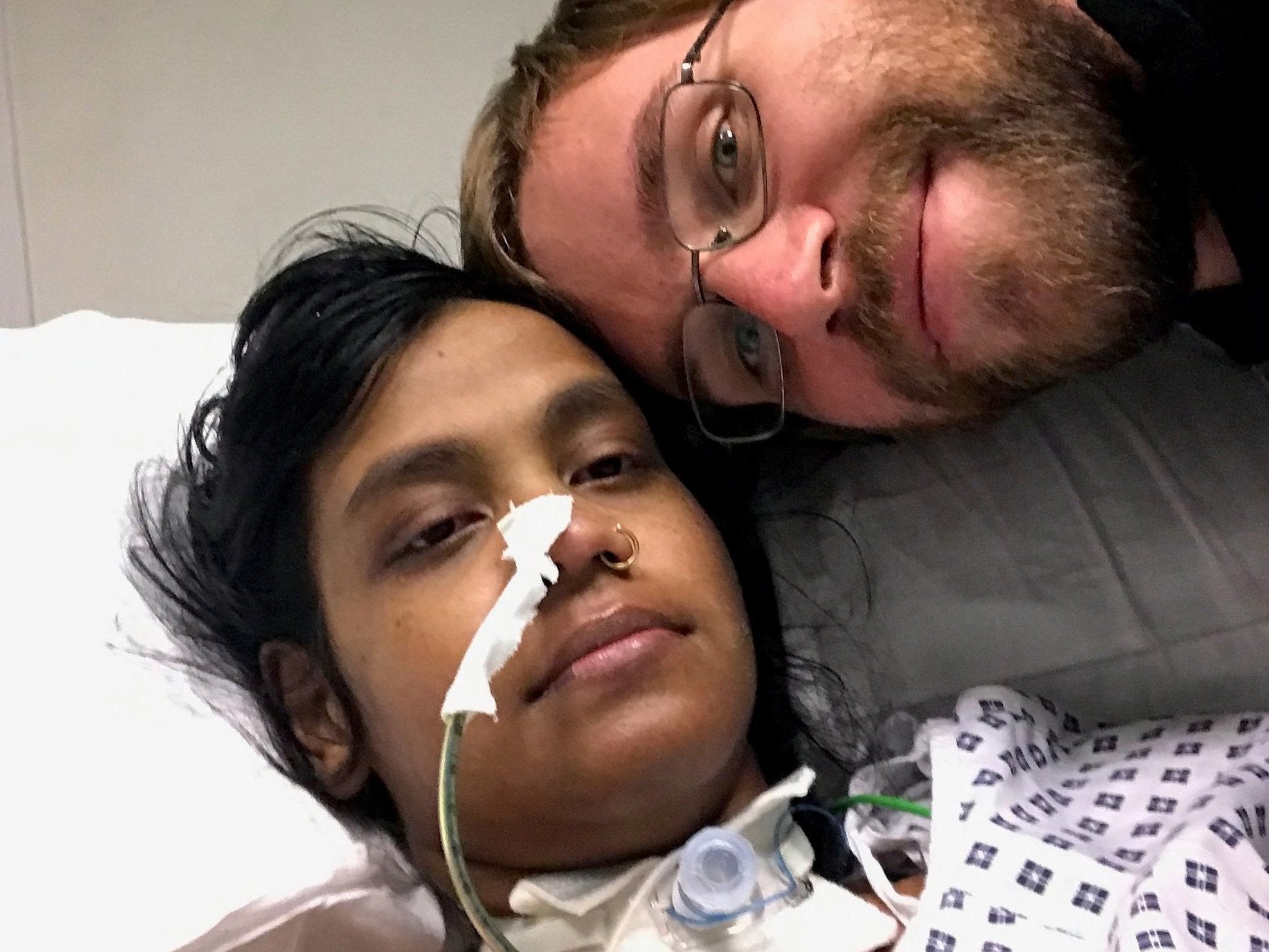 Ms Esapathi and her fiance Mr Mangler following her major surgery in September