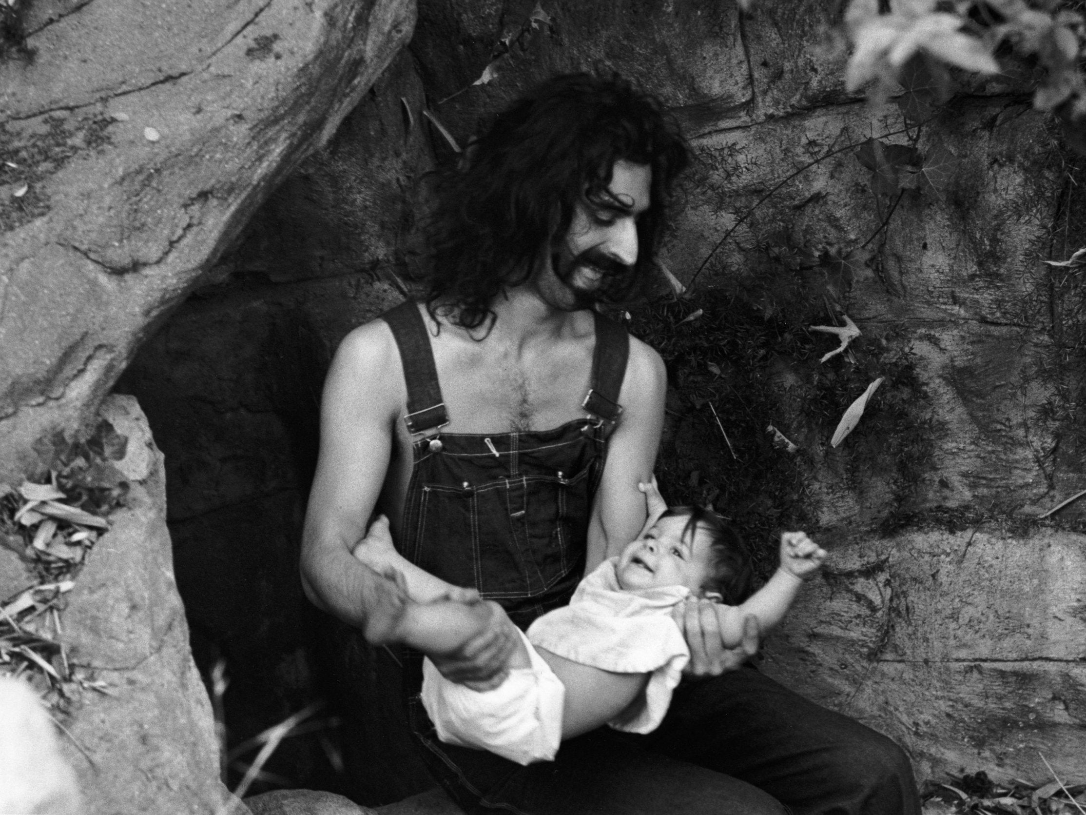 Zappa poses for a portrait with daughter Moon Unit in February 1968