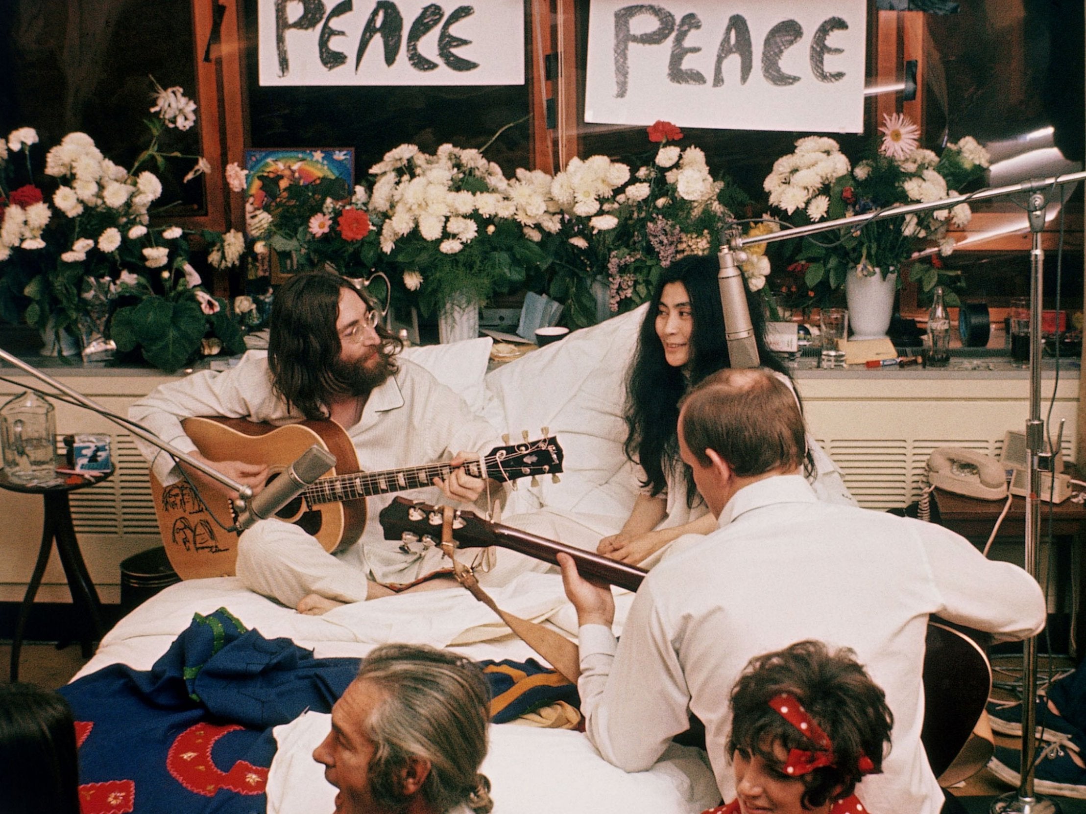 &#13;
John Lennon and Yoko Ono on their bed in the Queen Elizabeth Hotel in Montreal in 1969 &#13;