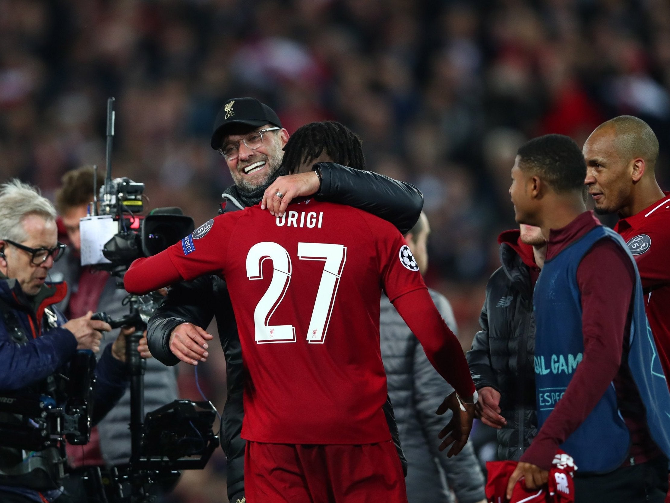 Jurgen Klopp embraces Divock Origi after his two goals against Barcelona