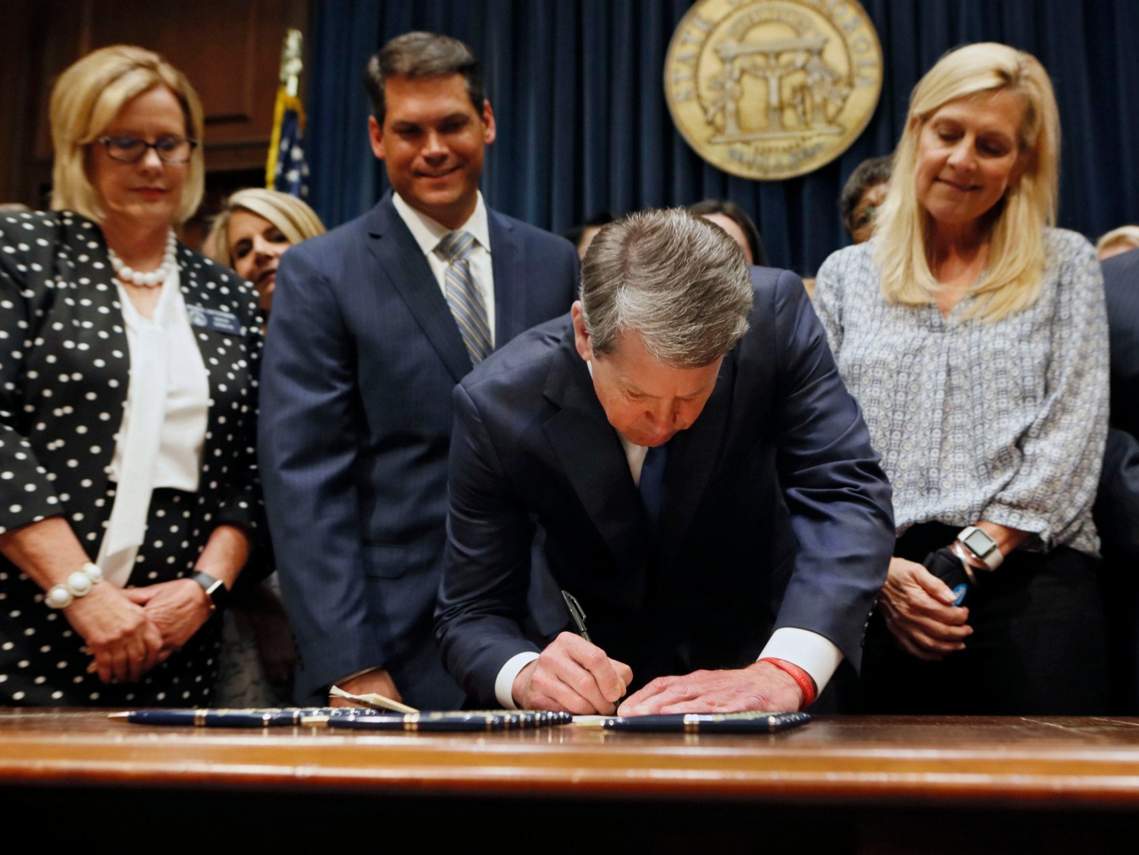 Georgia's governor Brian Kemp signs legislation banning abortions after a foetal heartbeat is detected. A wave of anti-abortion laws has swept the southern US in recent months