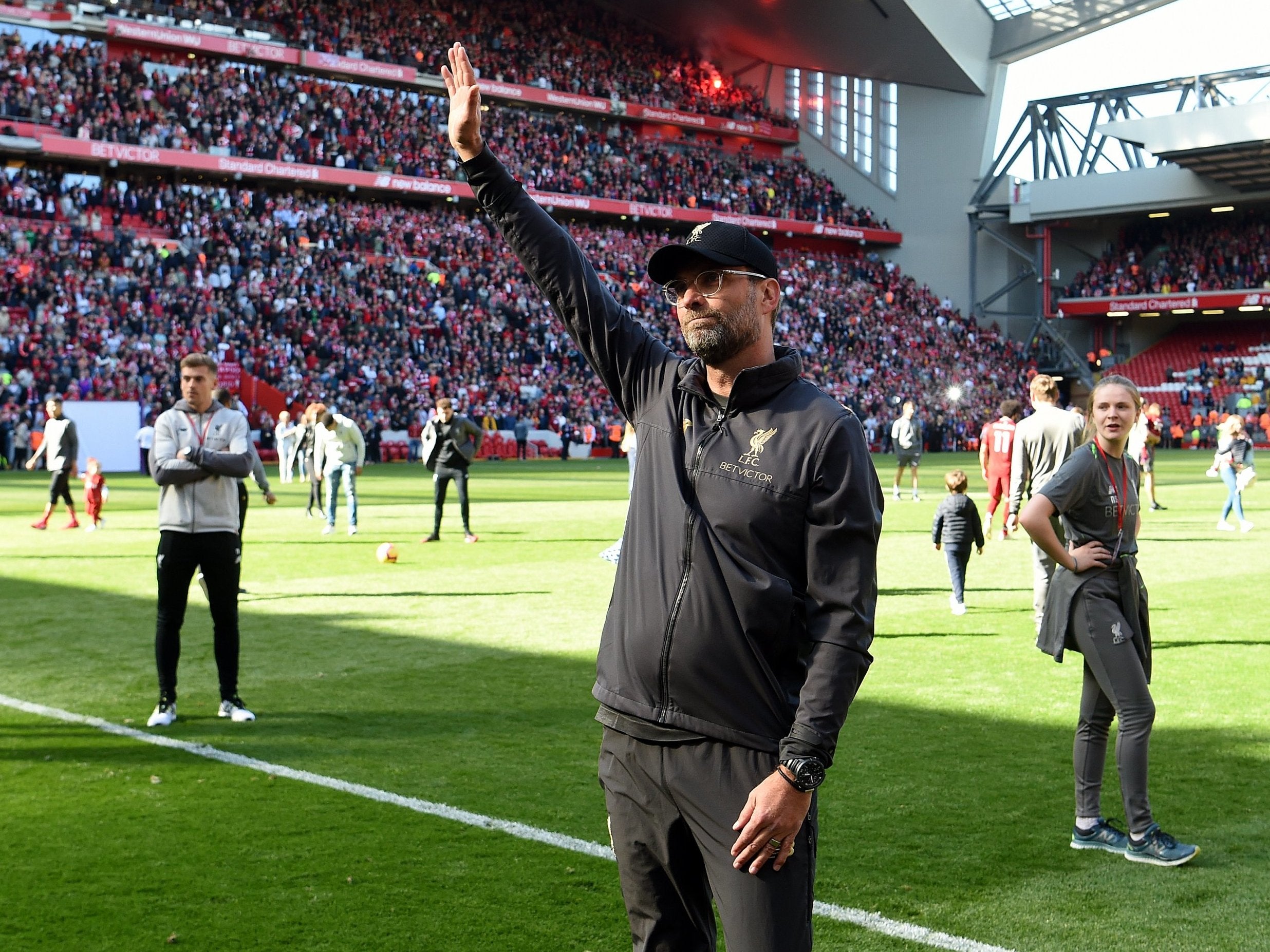 Jurgen Klopp salutes the Liverpool fans at Anfield