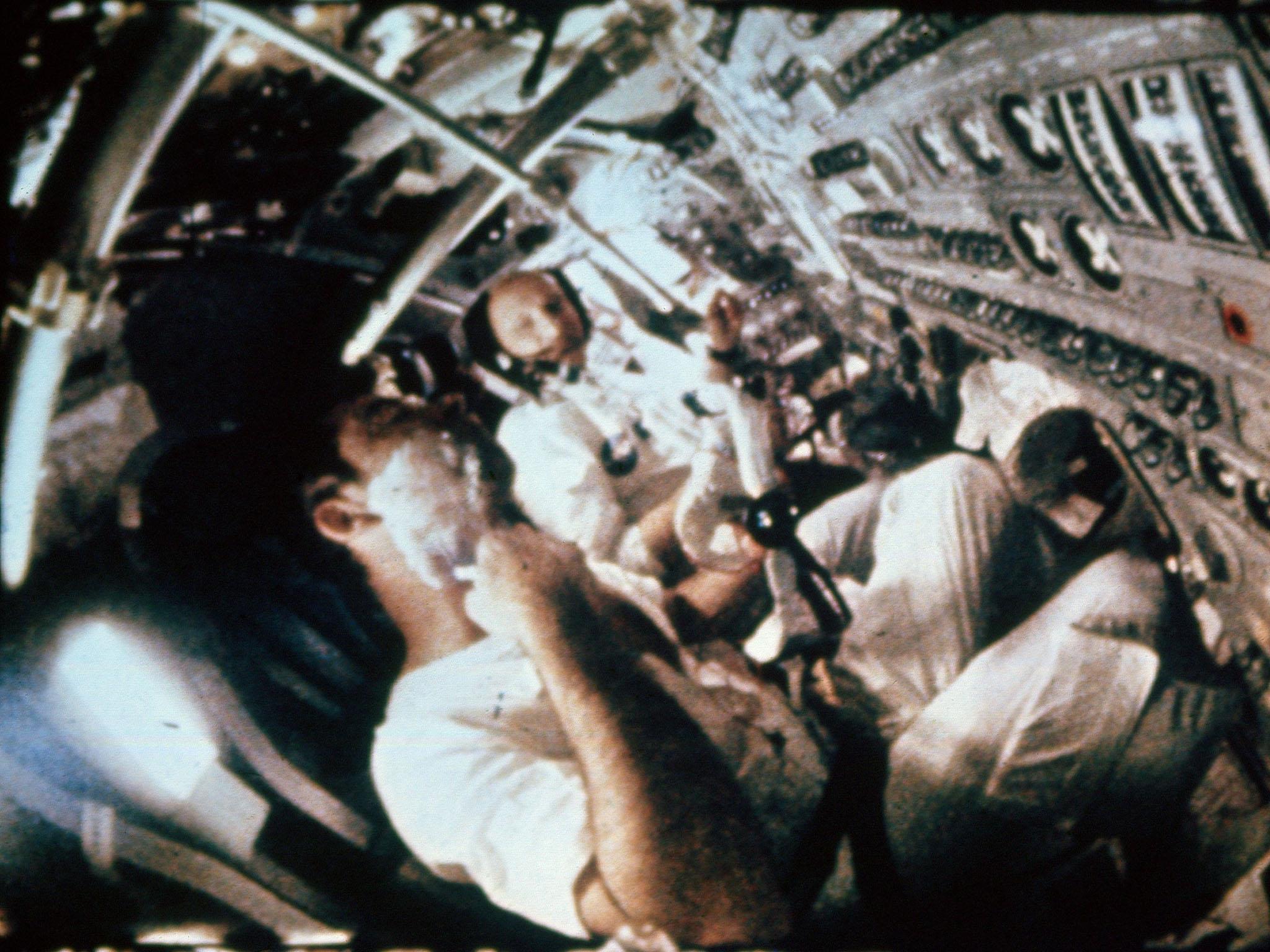 John Young shaving aboard the Apollo 10 spacecraft (Rex)