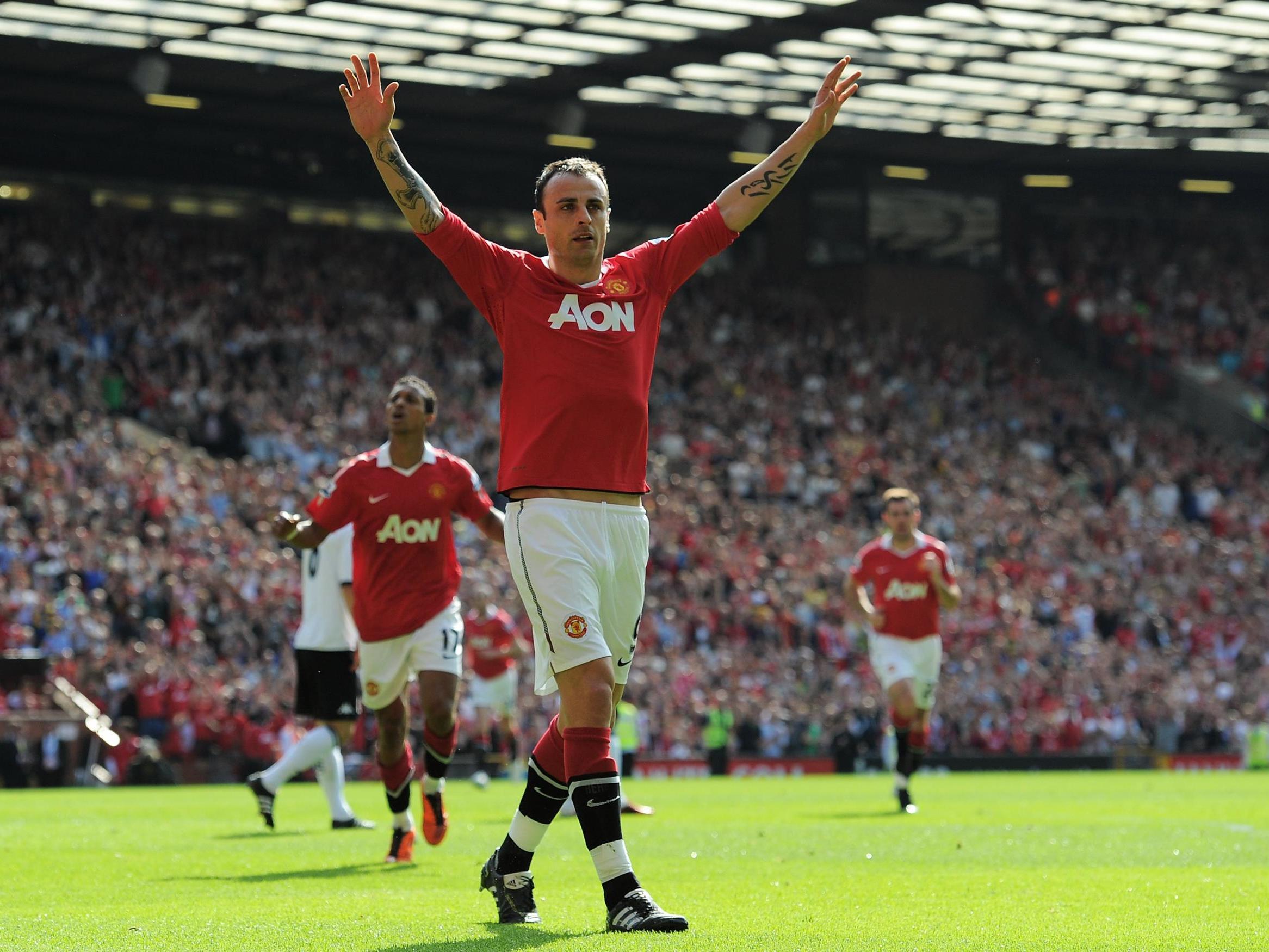 Berbatov celebrates scoring for United (Getty Images)