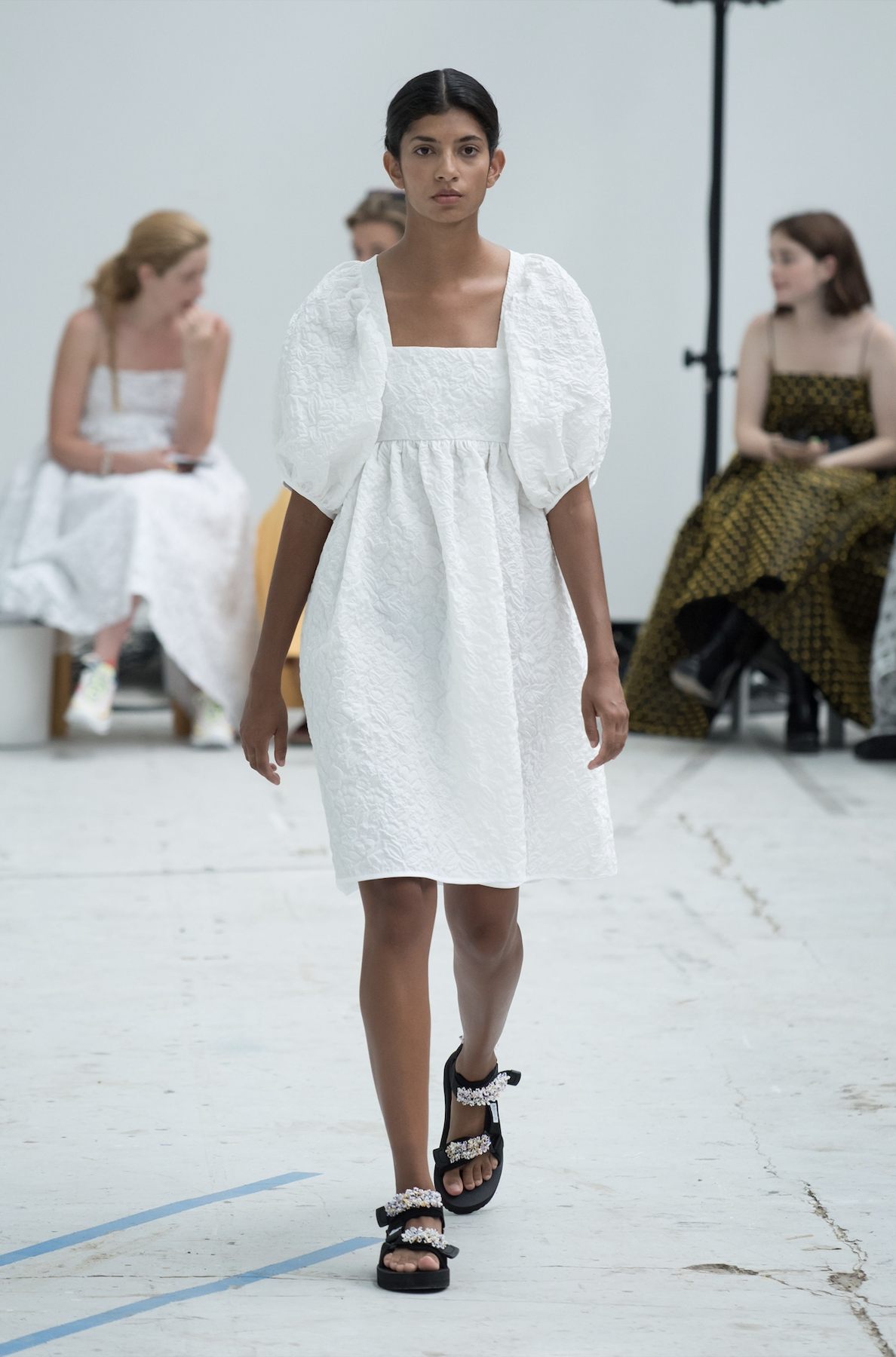 Cecilie Bahnsen's spring/summer 2019 garments were worn with pearl-decorated sandals by Suicoke (Rex)