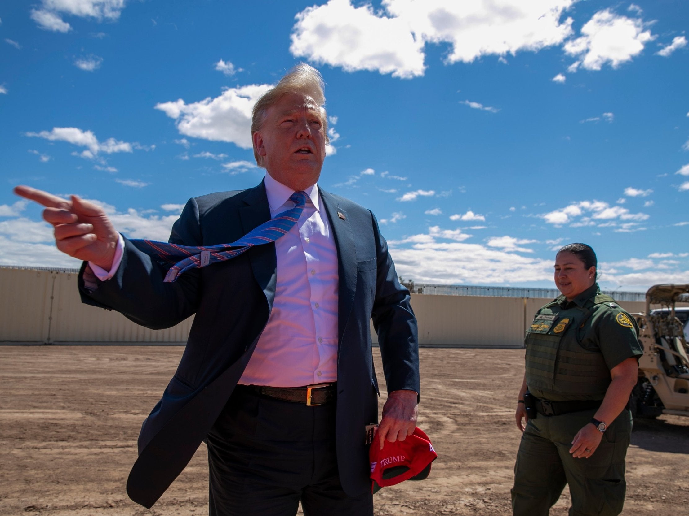 Trump complains border wall plans are 'ugly', officials say