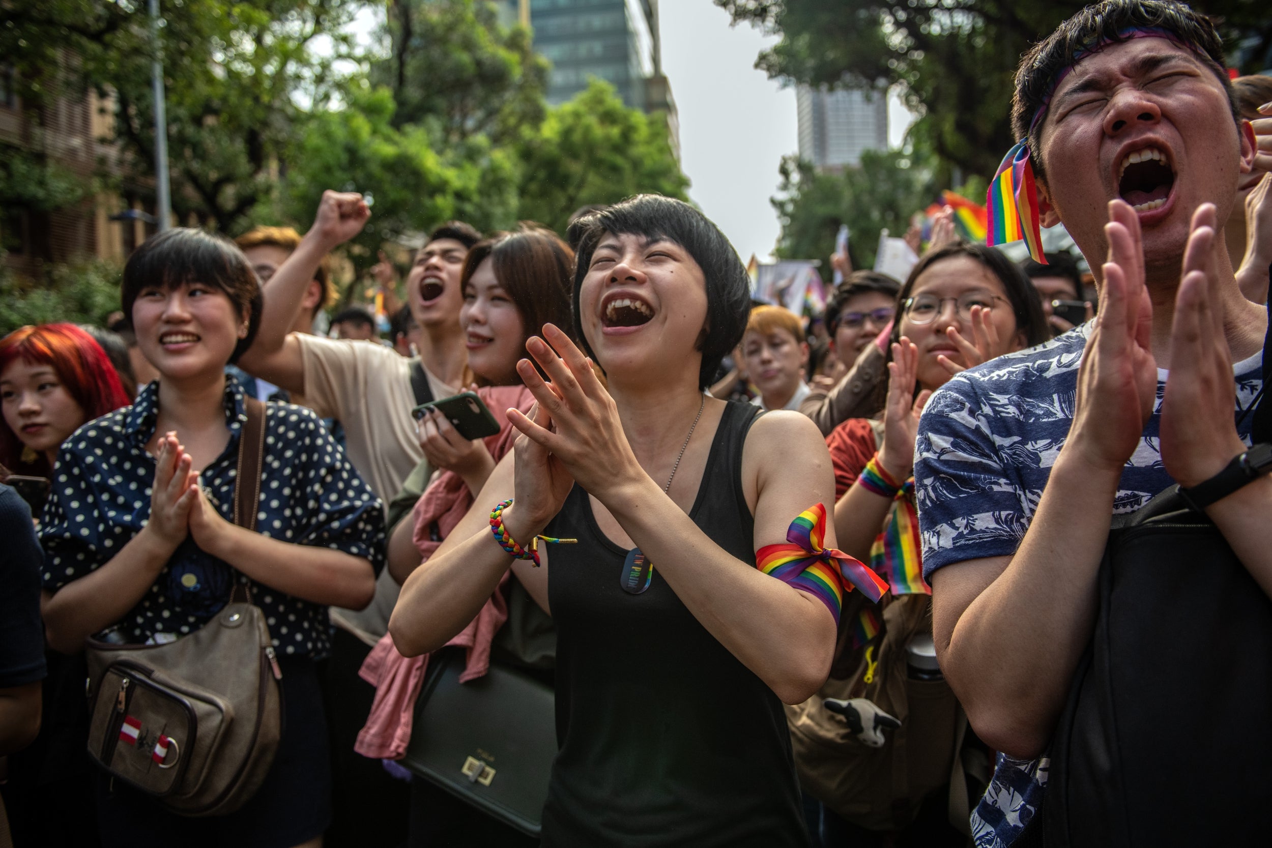 People celebrate after the announcement