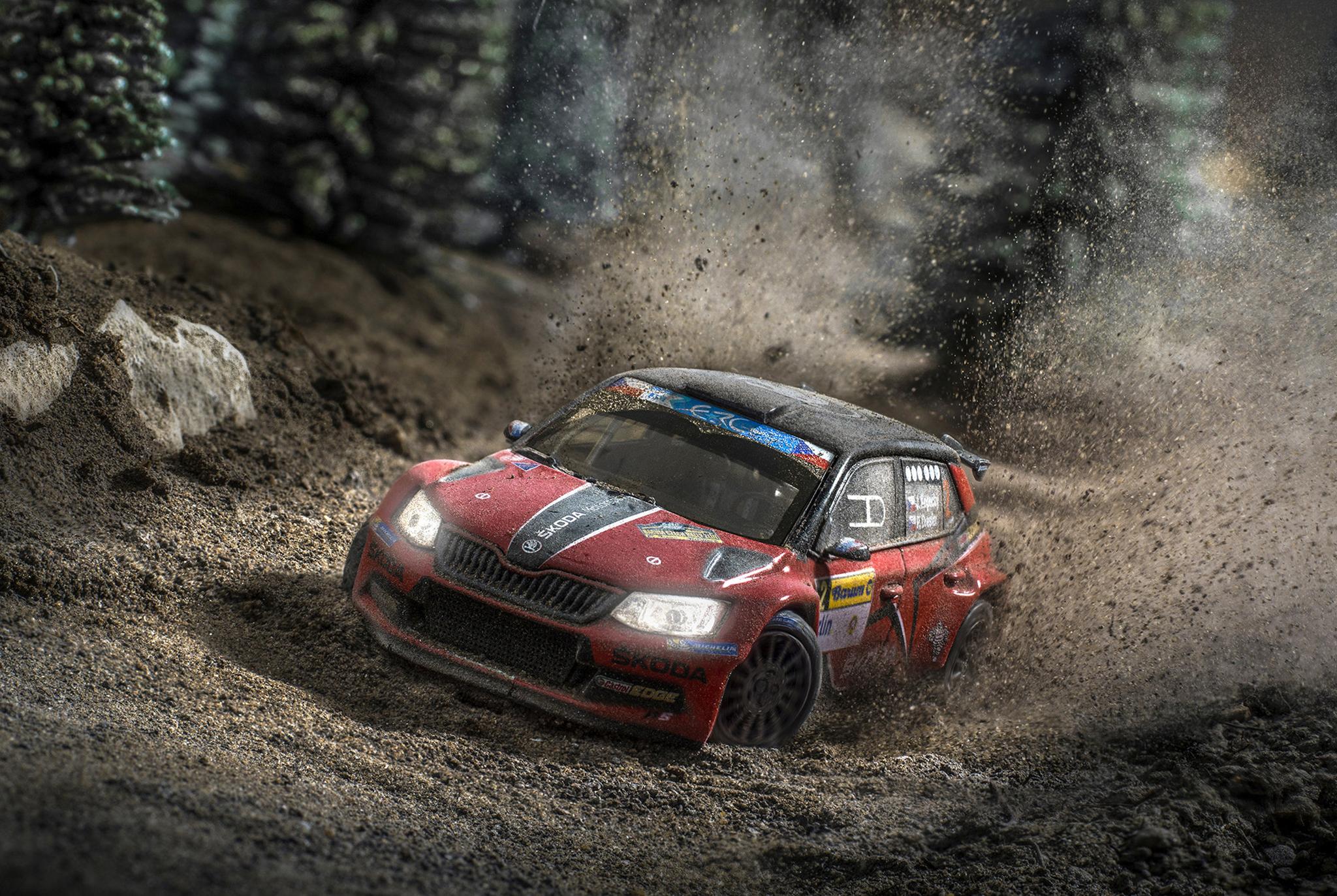 A Skoda Fabia R5 races around a dirt track...