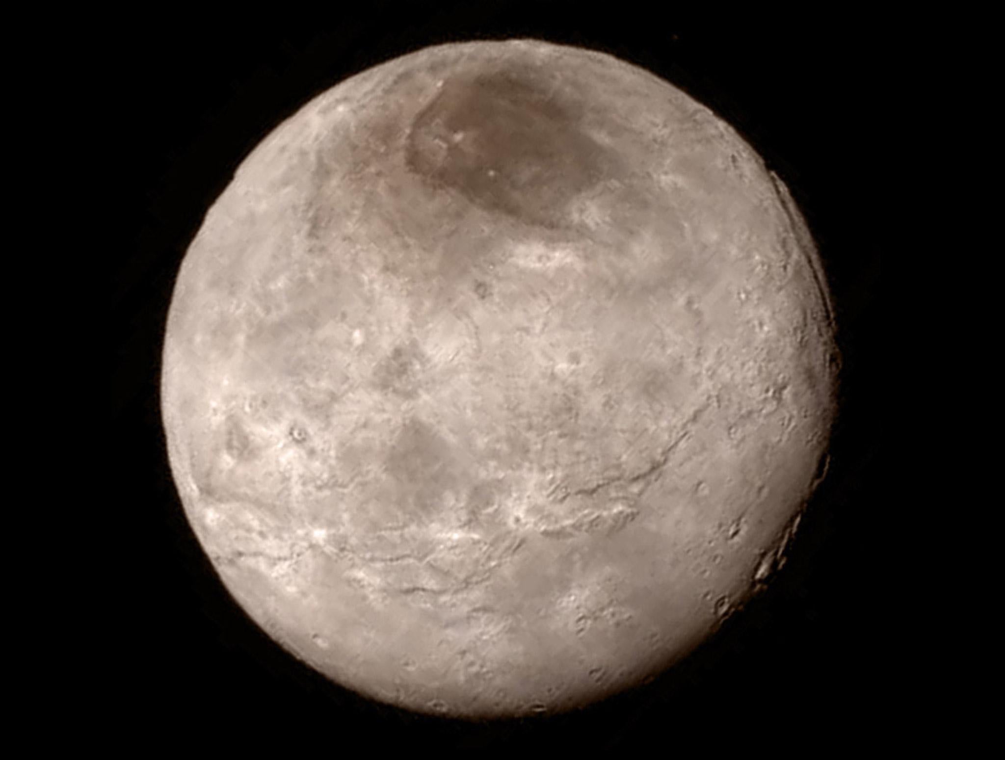 Pluto's largest moon Charon is shown from a distance of 289,000 miles (466,000 kilometers) from the Long Range Reconnaissance Imager (LORRI) aboard NASA's New Horizons spacecraft