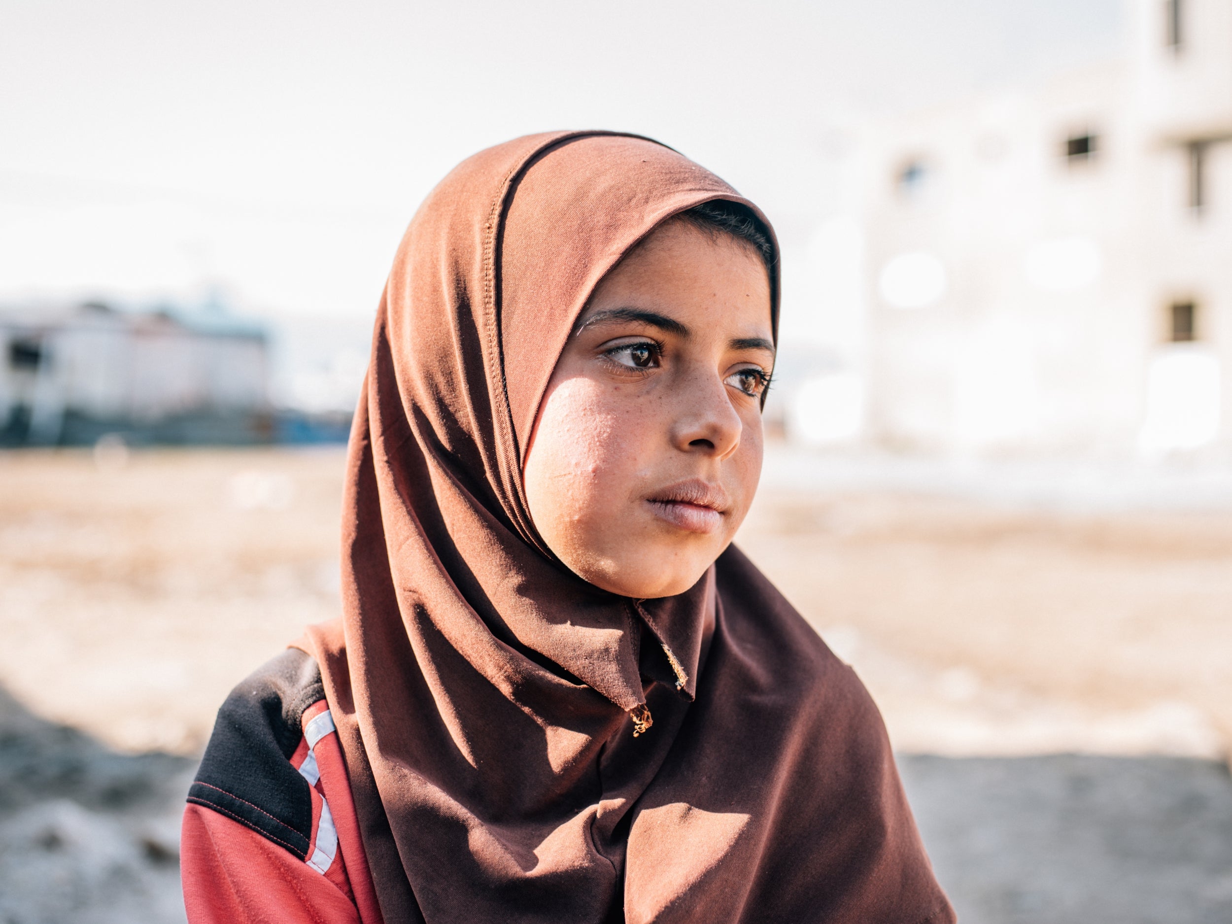 She arrived in Lebanon in 2013 from Reef Halab. The journey to Lebanon took three days across the mountain using smugglers at a cost of $300. Sharook’s mother, Tharah, tripped and fell, breaking her arm on the journey whilst six months pregnant. The Syrian Free Army destroyed their schools because they were funded by the regime state. She dreams of becoming a doctor. Tharah laughs, turns to Sharook and said “how can you possibly dream of becoming a doctor if you have never been to school?”