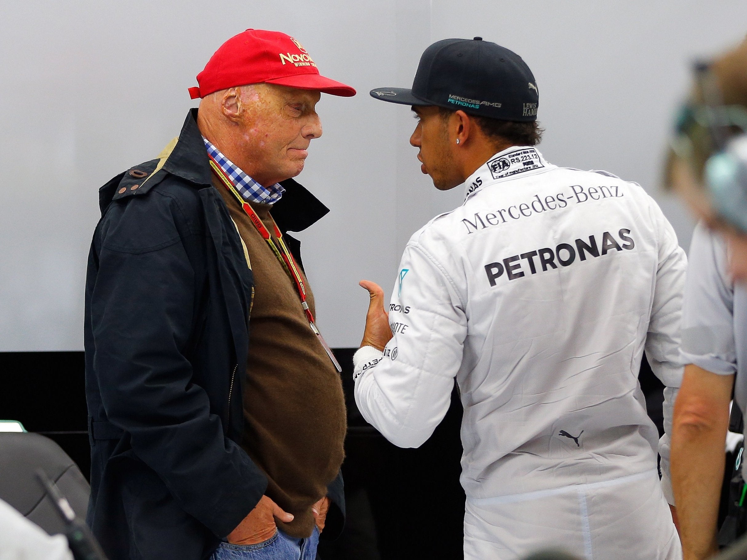 Lewis Hamilton and Niki Lauda chat at the Sakhir circuit near Manama, Bahrain