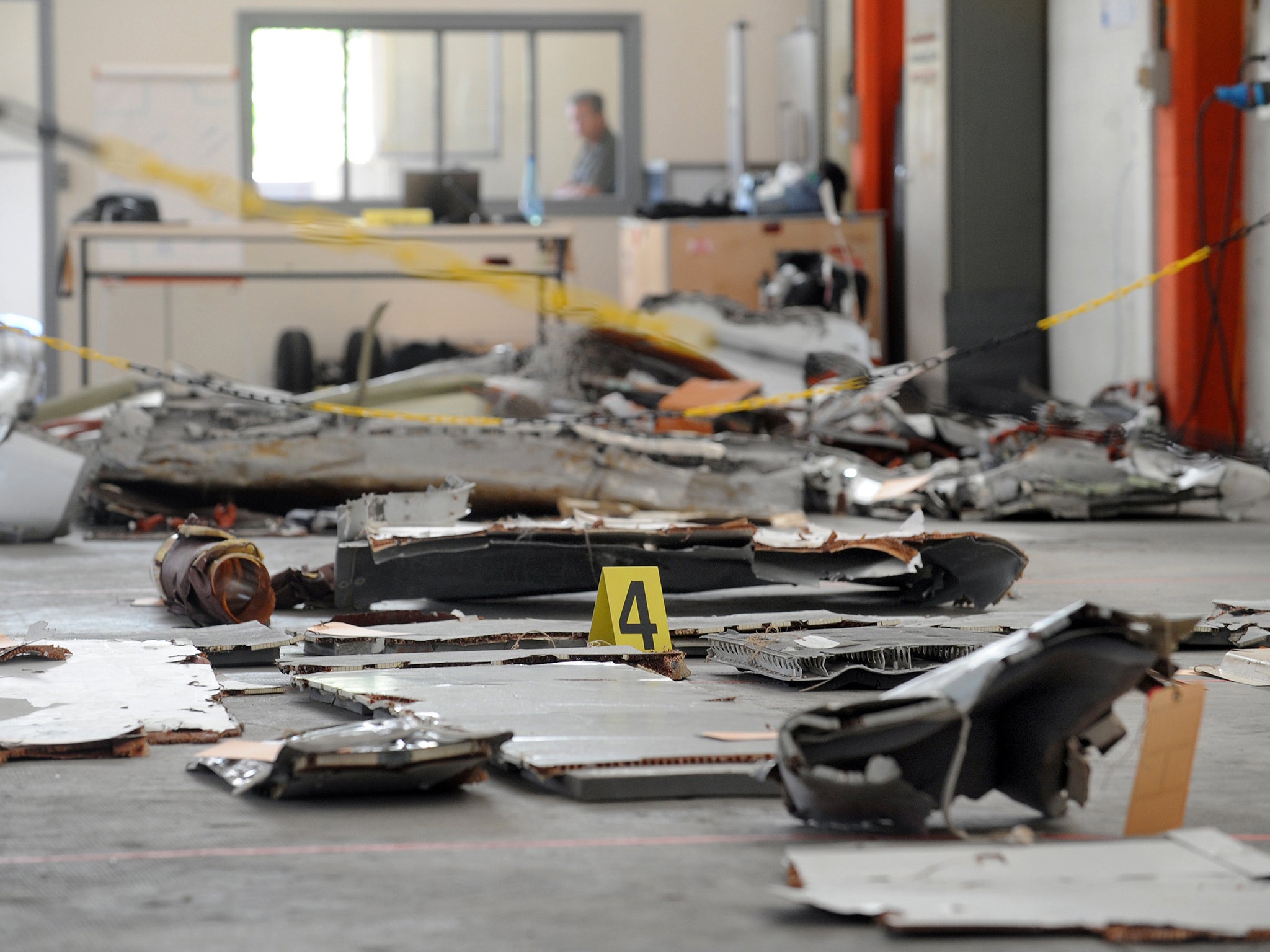 Debris from Air France flight 447 is laid out for examination