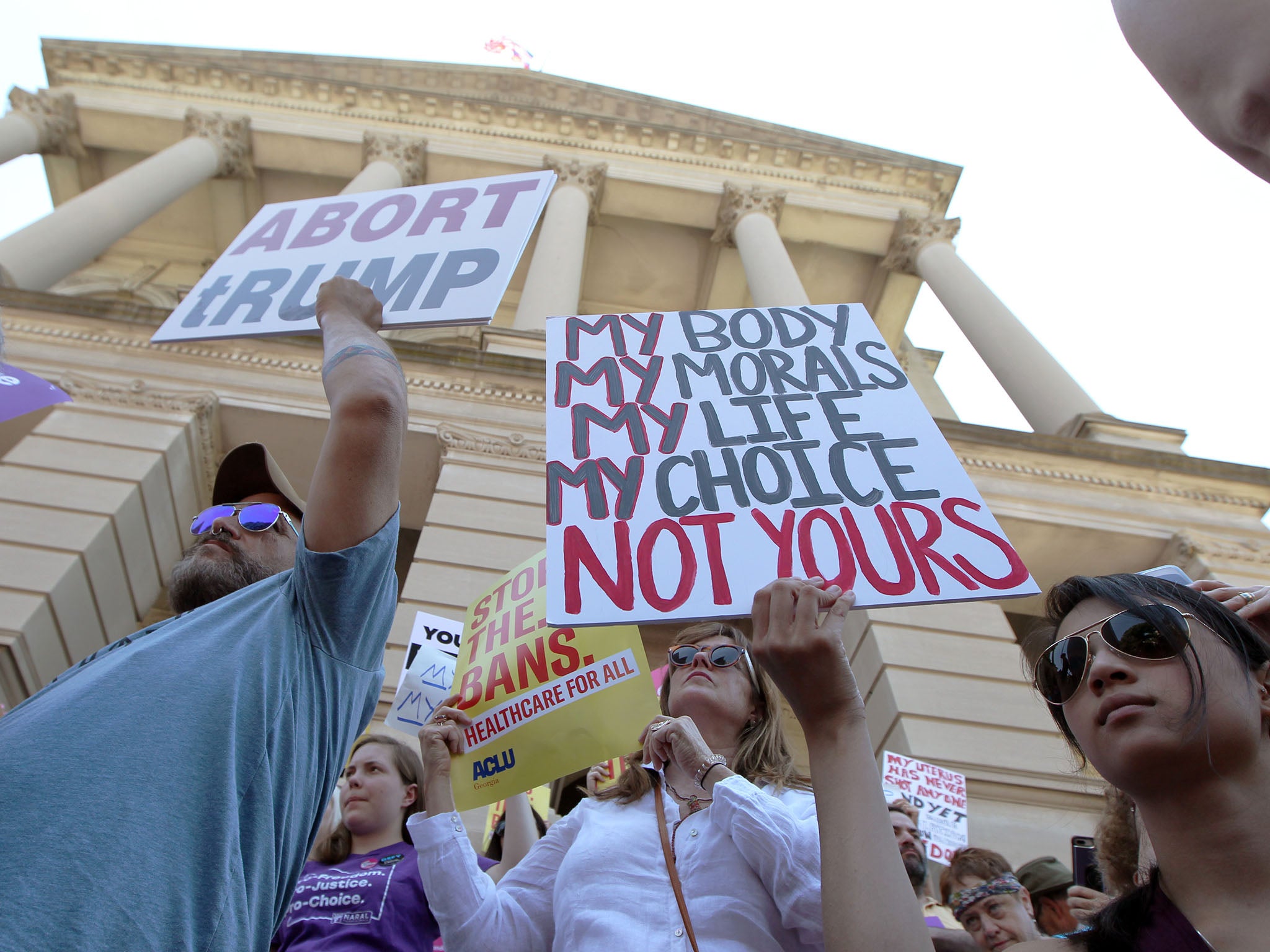 Atlanta saw people brandishing signs that read ‘Abort Trump’