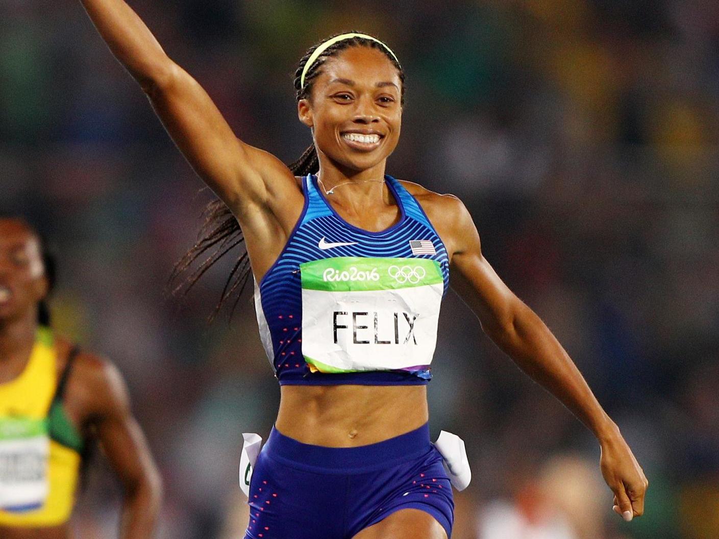 Allyson Felix reacts after winning gold for the US during the Women's 4 x 400 meter Relay at the 2016 Rio Olympic Games