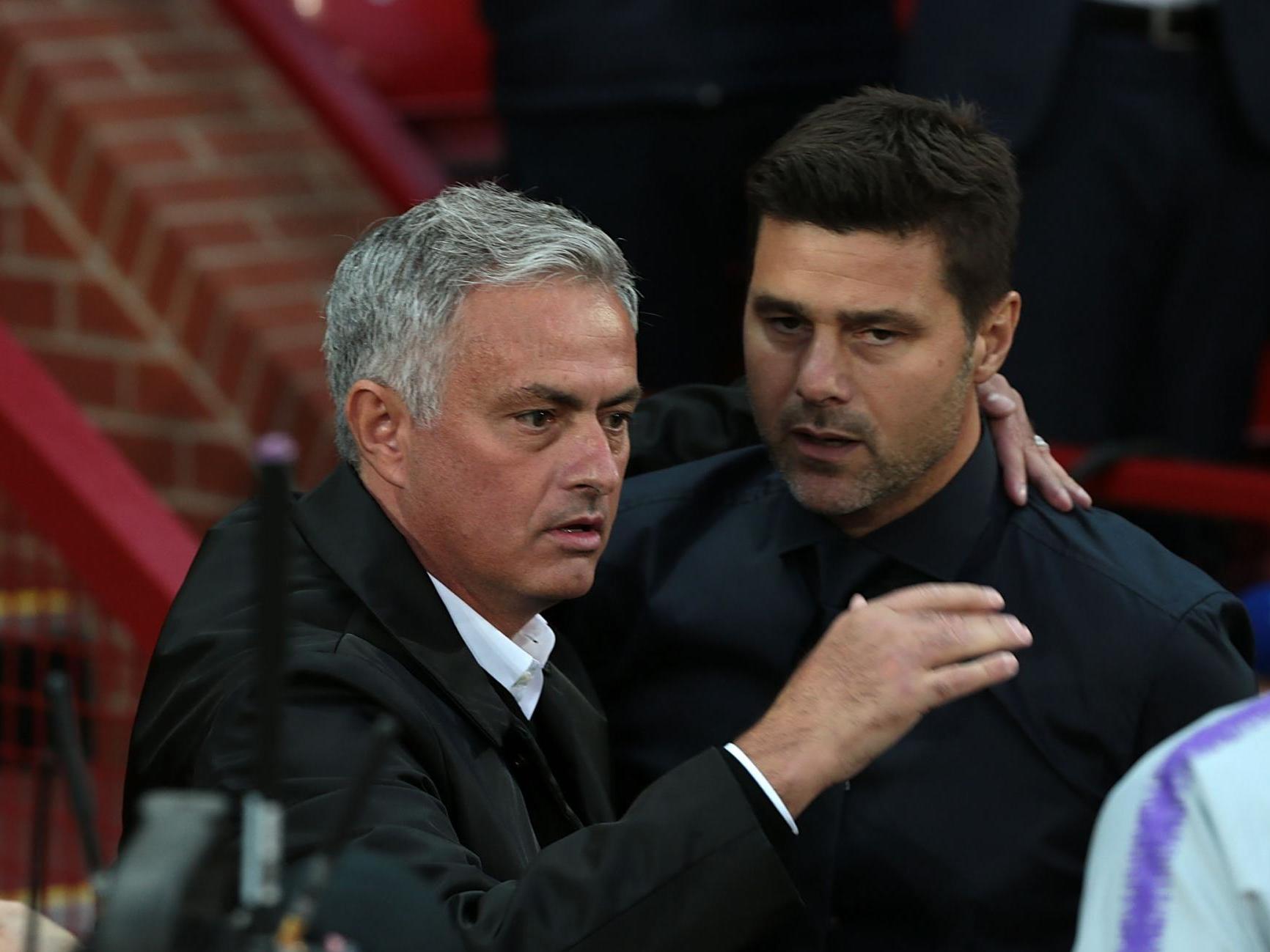 Jose Mourinho and Mauricio Pochettino embrace at Old Trafford (Getty )