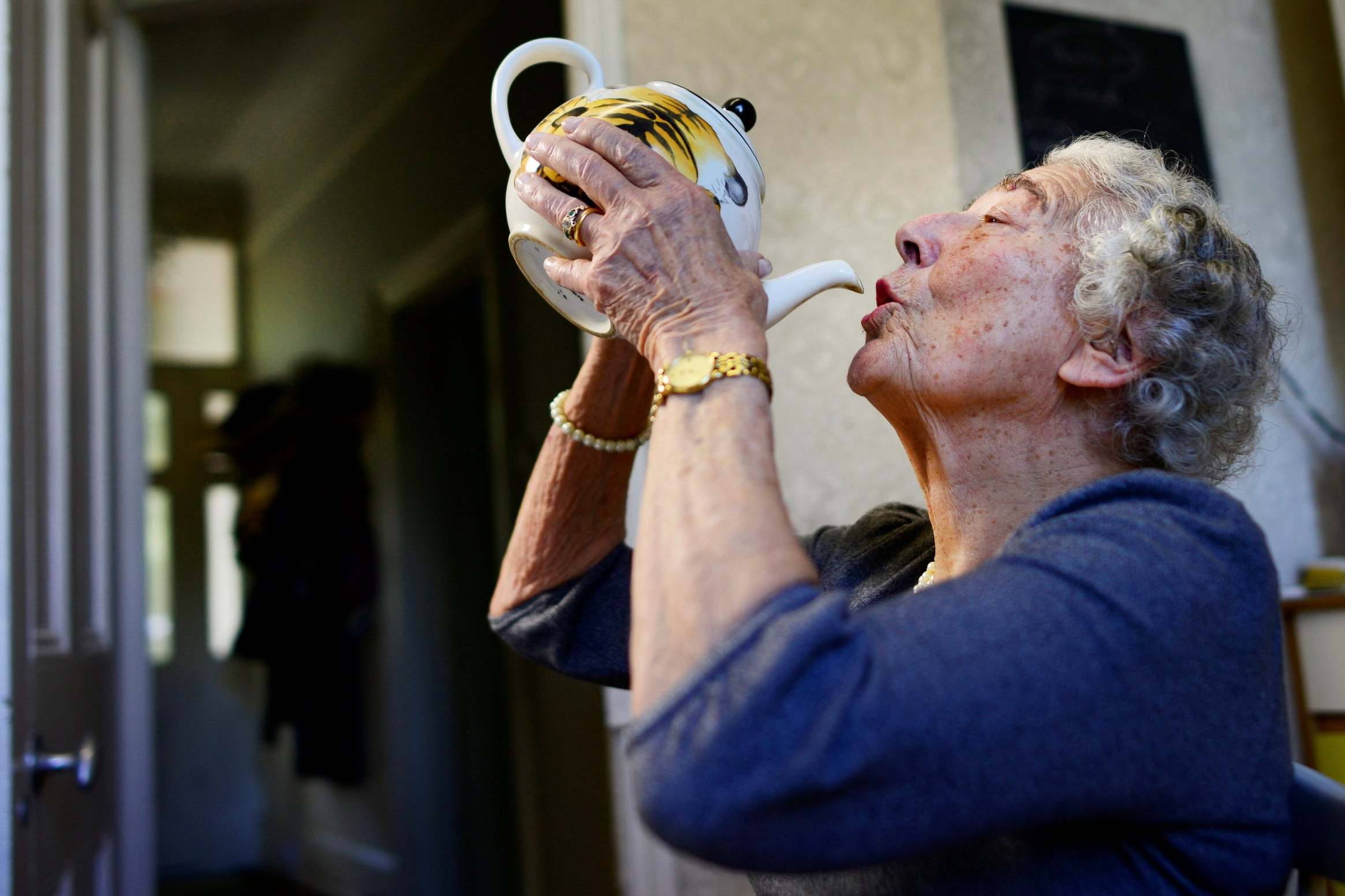 Kerr drinks from a tea pot in 2015 as she recreates a scene from ‘The Tiger Who Came To Tea’