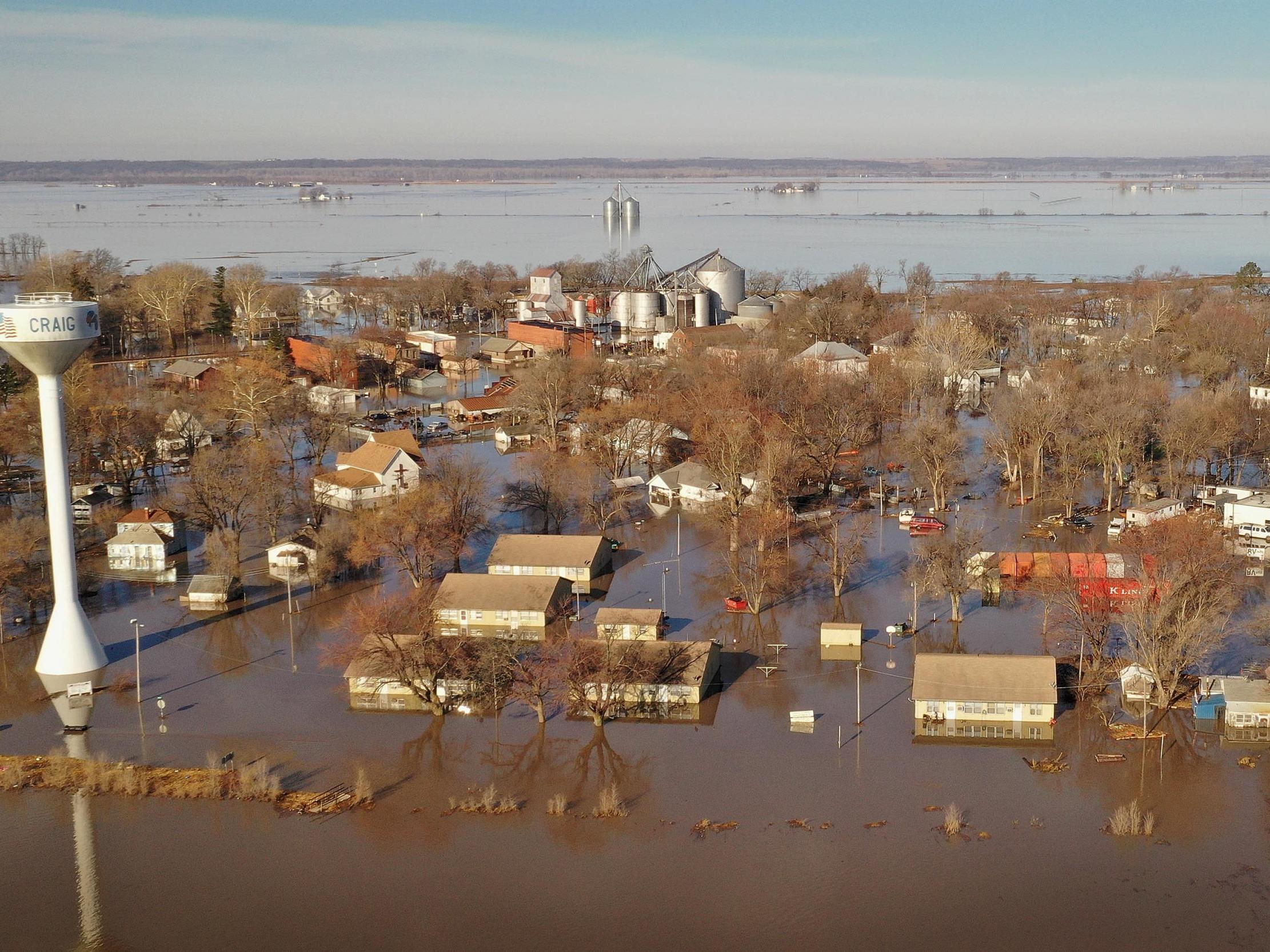 US senate passes bill granting disaster aid to victims of wildfires, flooding (pictured) and hurricanes