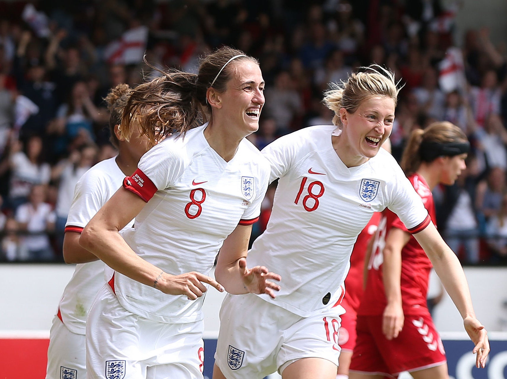 Jill Scott celebrates scoring