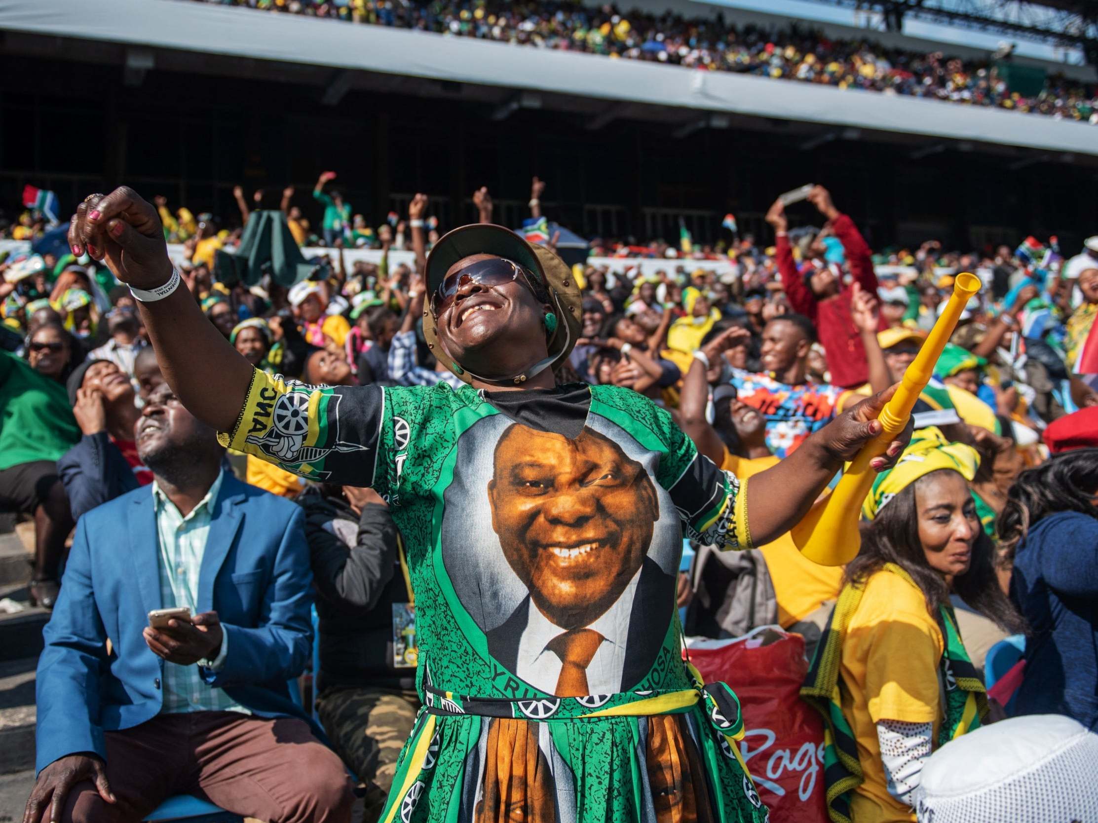 ANC supporter celebrates Ramaphosa's inauguration ceremony