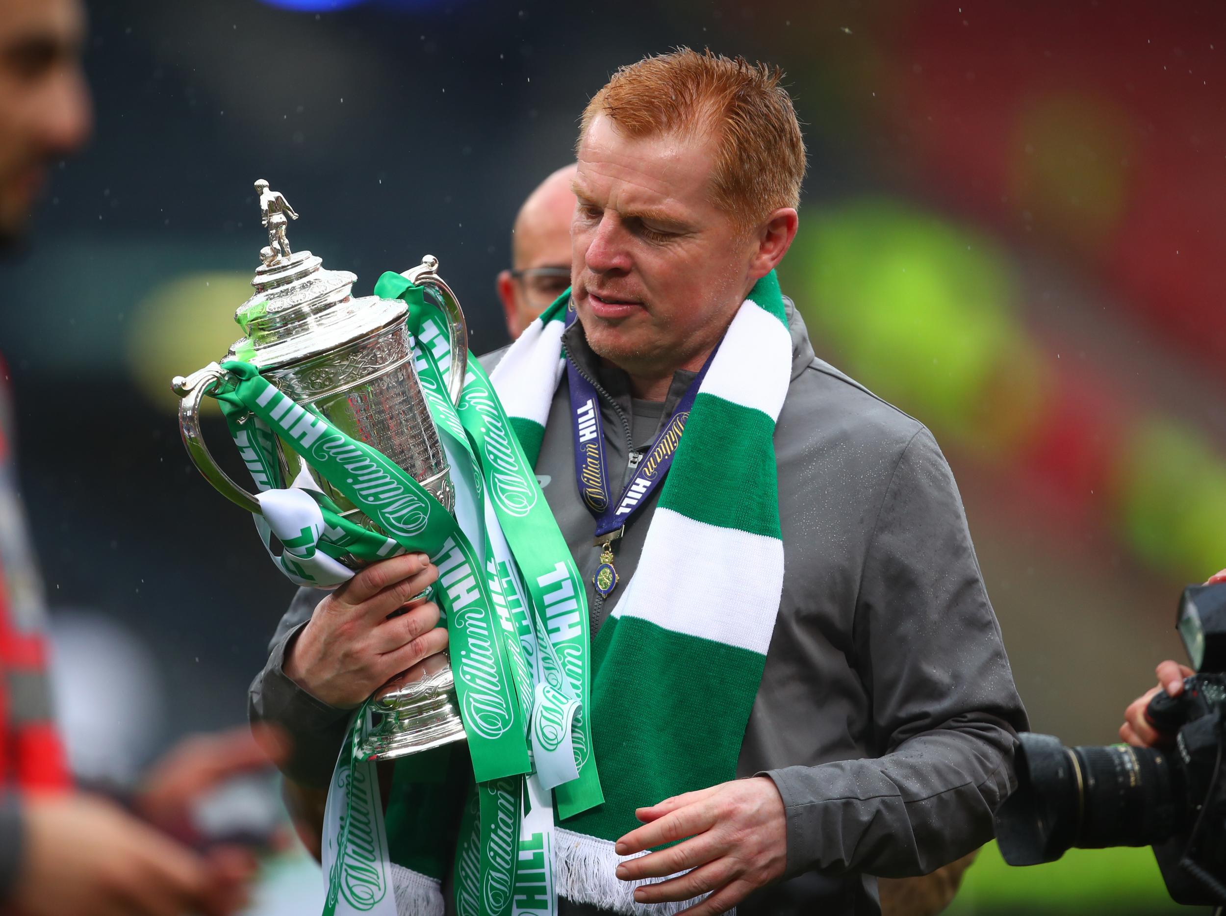 Neil Lennon celebrates with Celtic's latest trophy