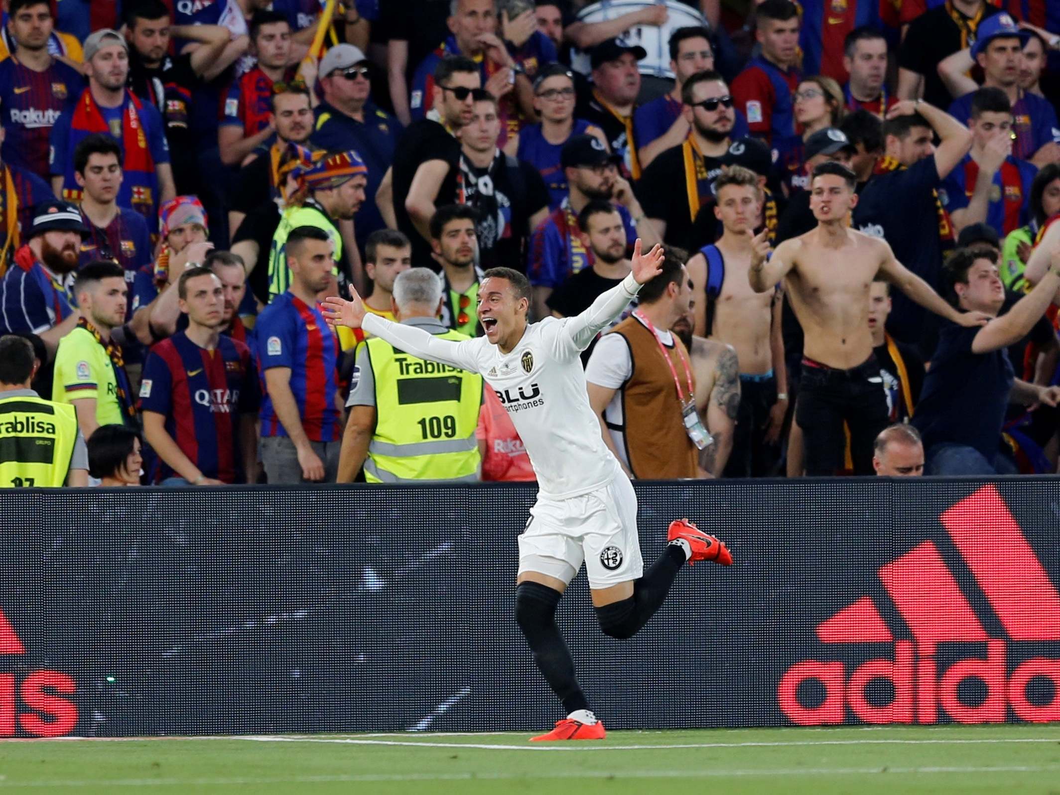 Rodrigo celebrates putting Valencia two goals ahead at half-time