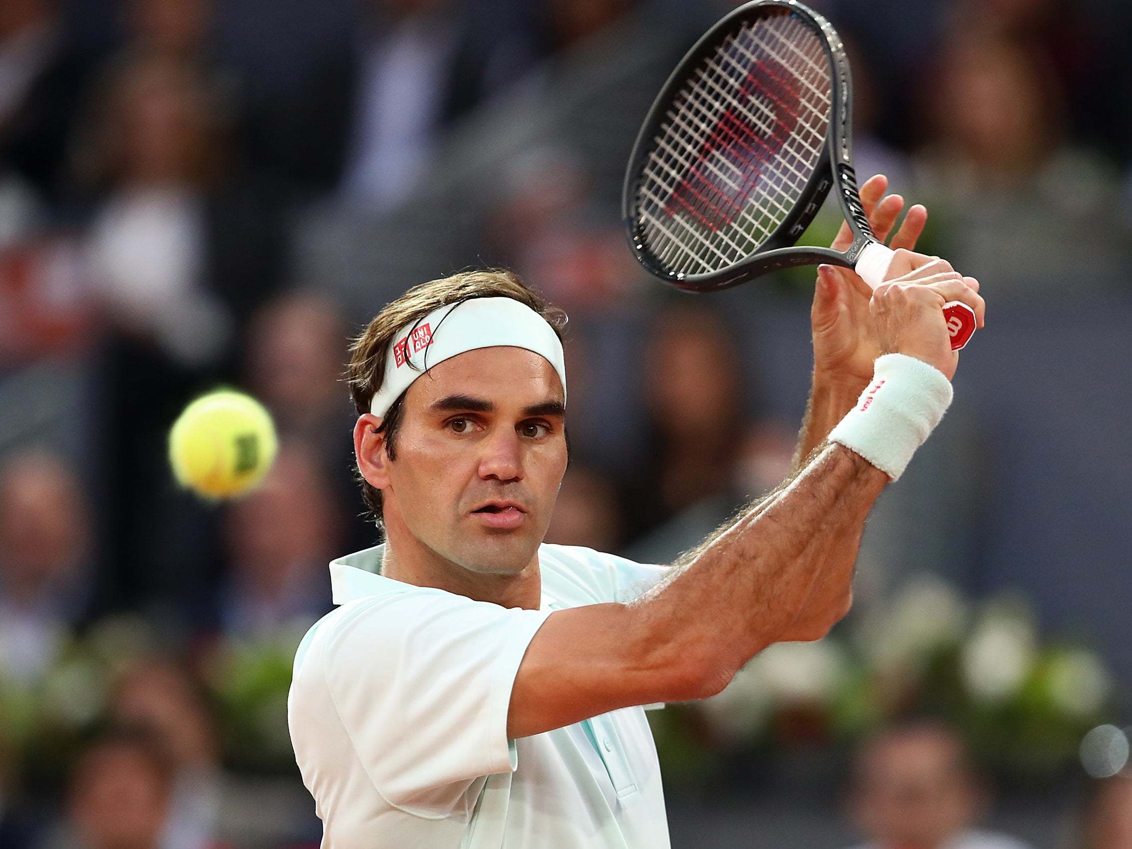 Federer sweeps past Gasquet on his return to clay