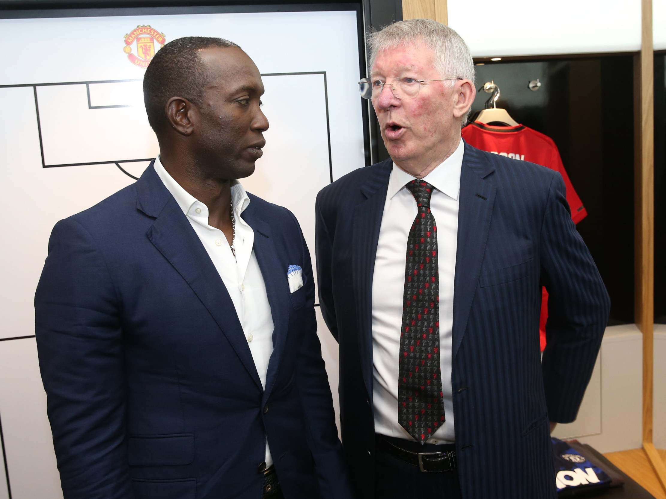 Sir Alex Ferguson chats to Dwight Yorke before kick-off