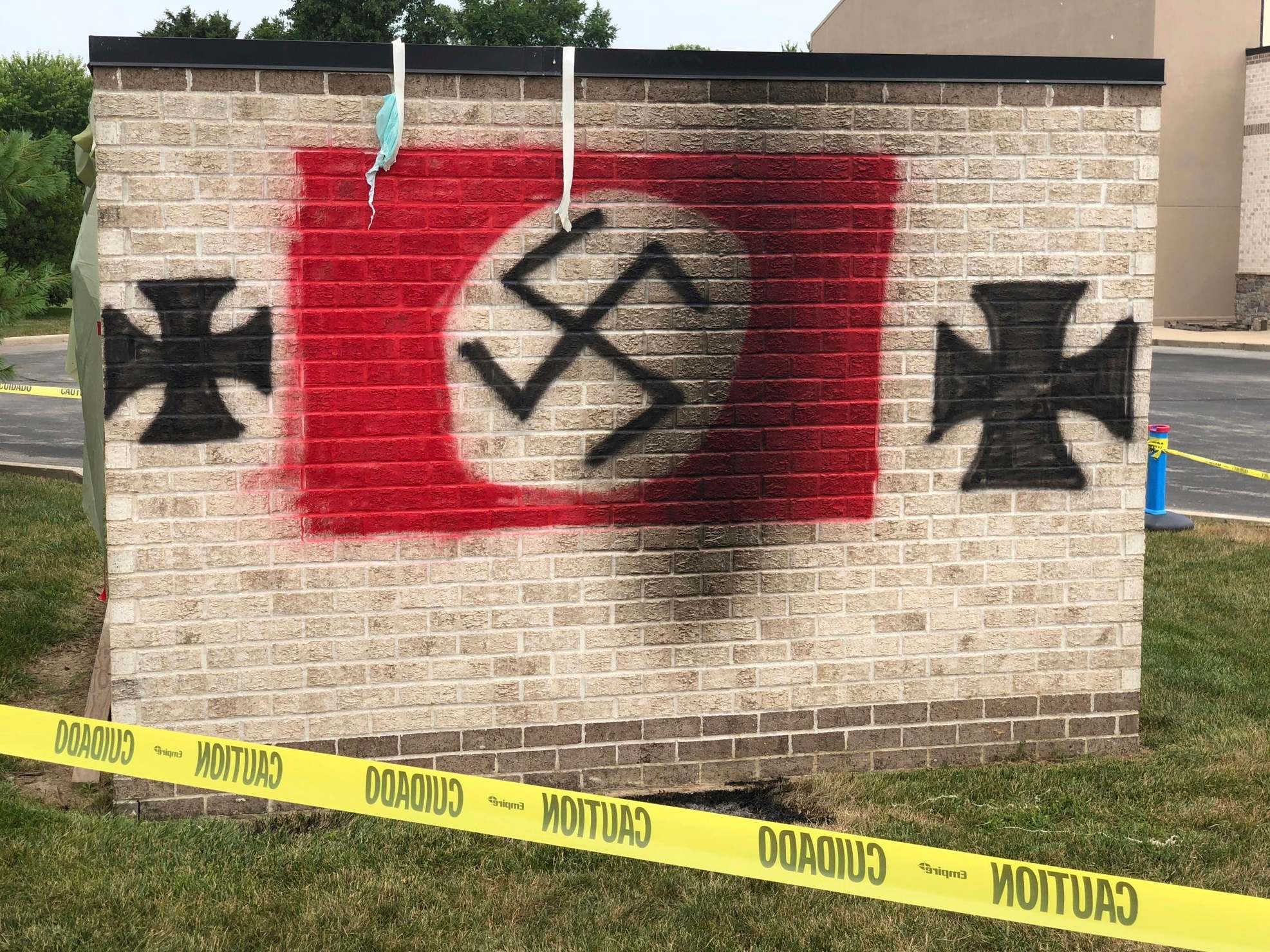 Nolan Brewer pleaded guilty to conspiring to violate civil rights after painting swastikas and iron crosses on the synagogue