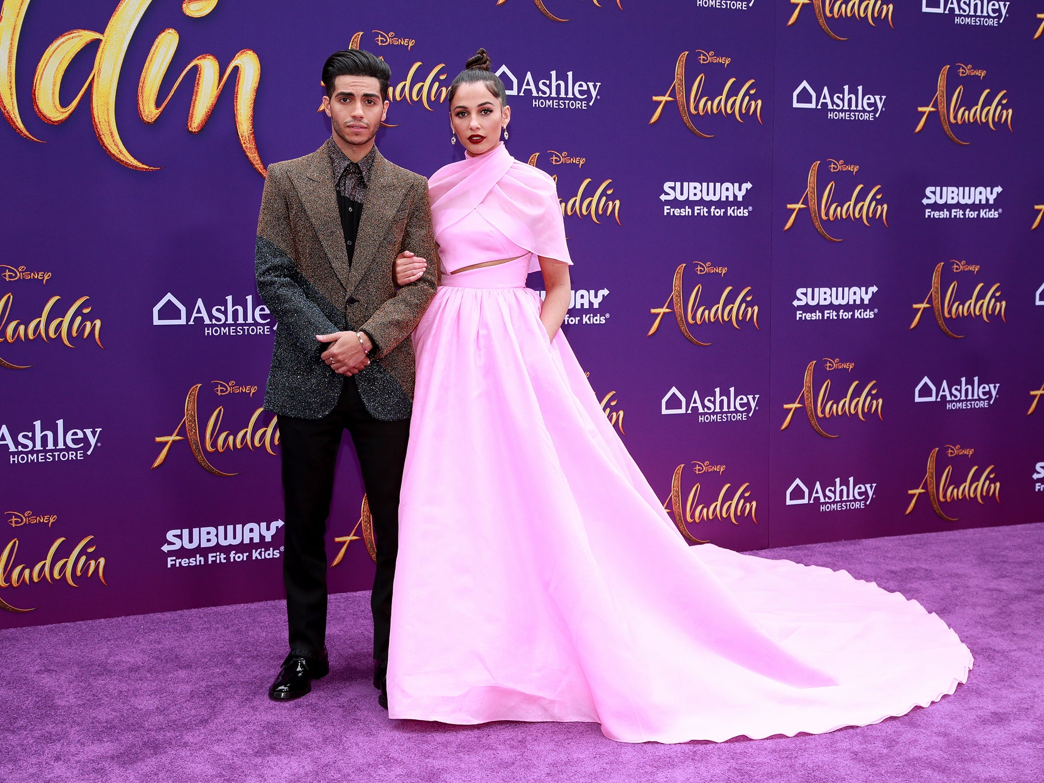 Mena Massoud and Naomi Scott attend the premiere in Los Angeles, California. (Getty/Rich Fury)