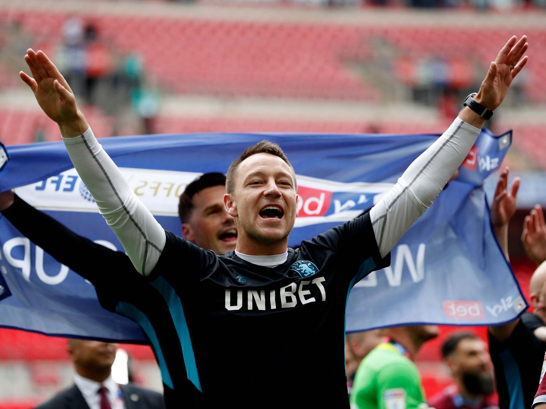 John Terry celebrates promotion with Aston Villa