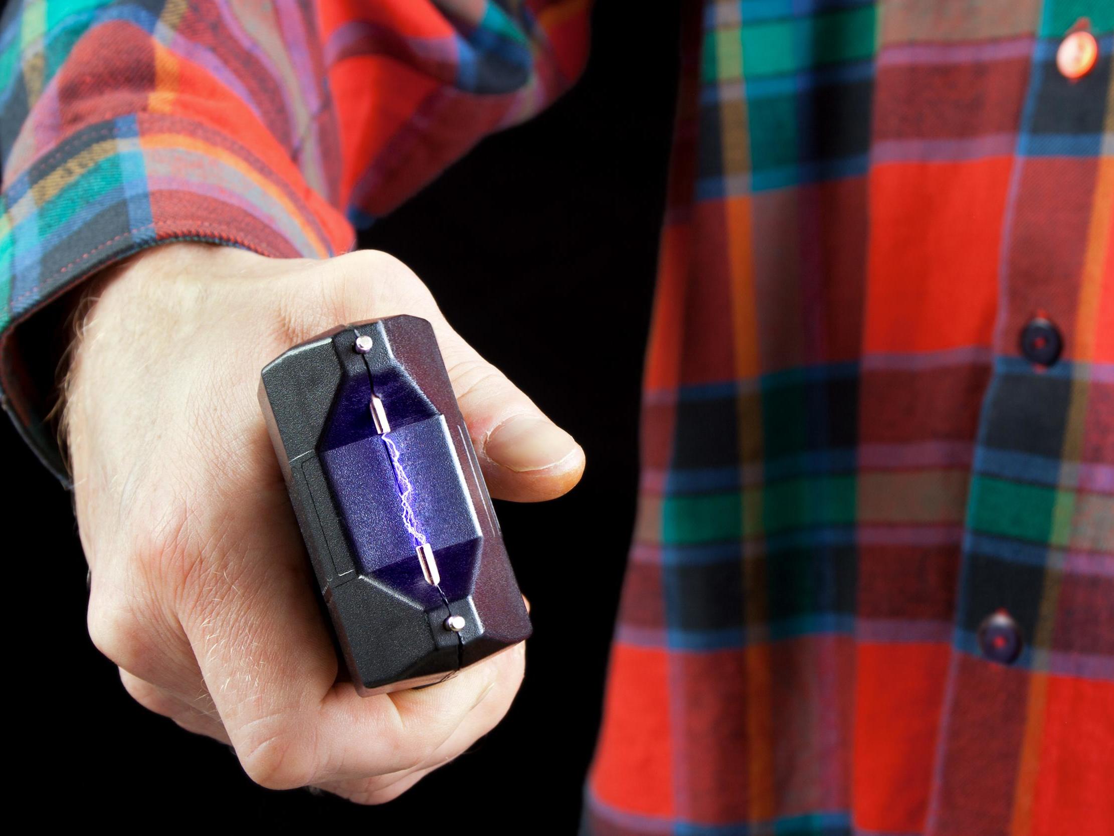 File image of man holding stun gun.