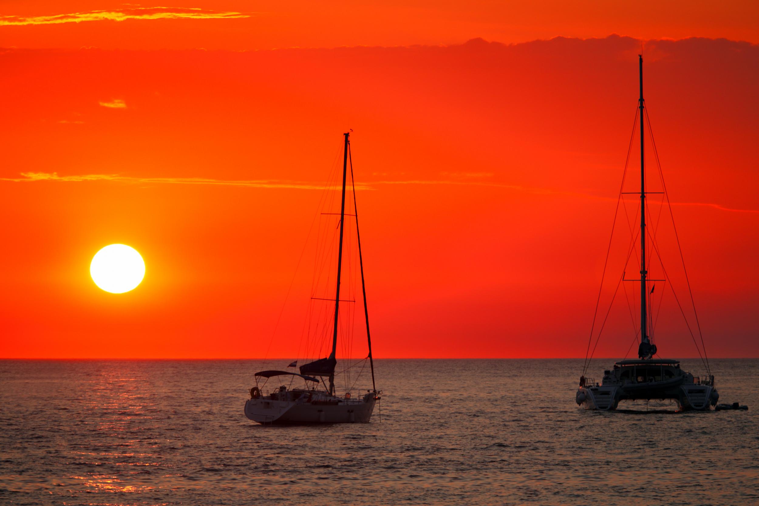 Watch the sun set from the open seas