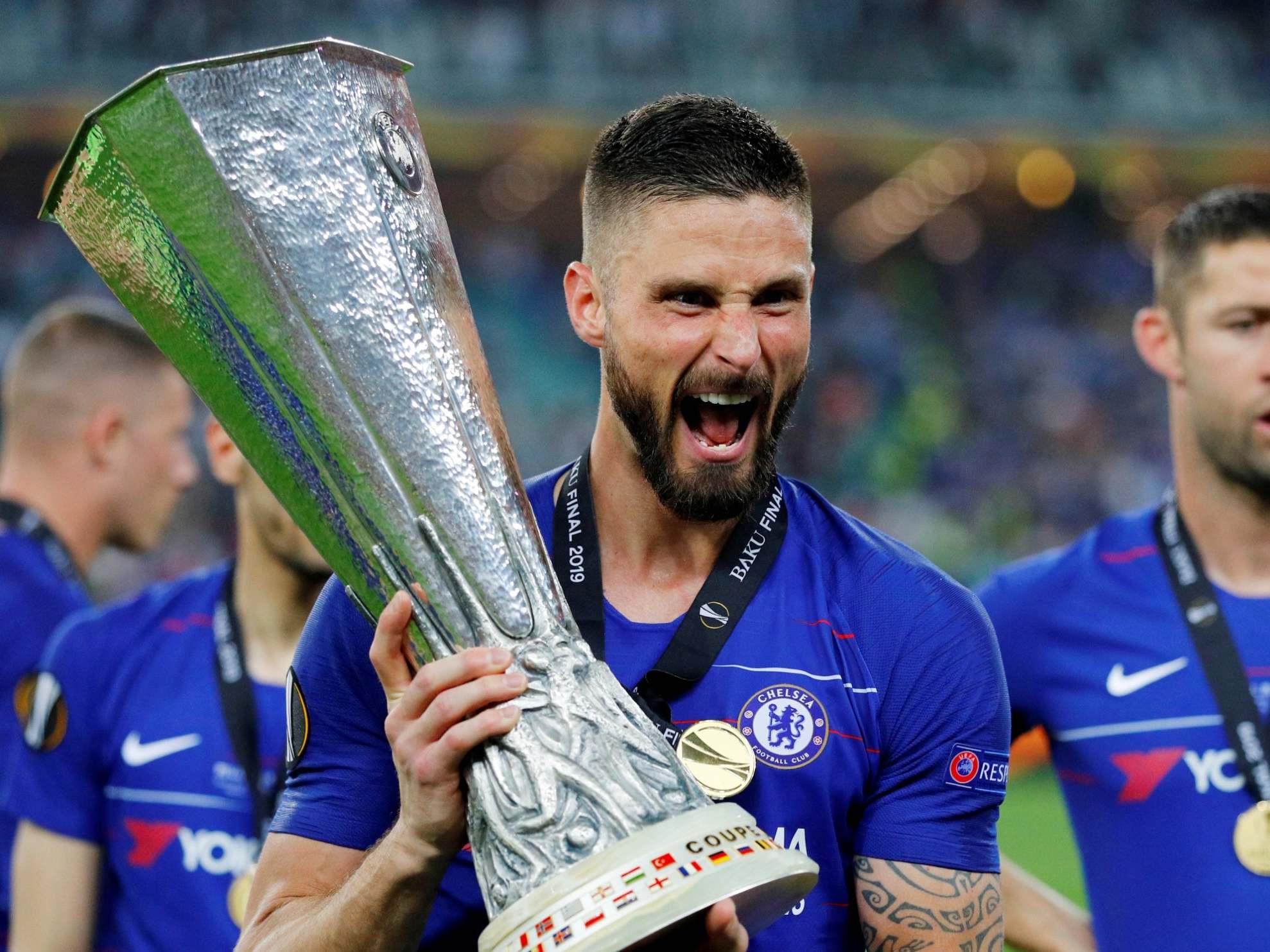 Olivier Giroud celebrates winning the Europa League