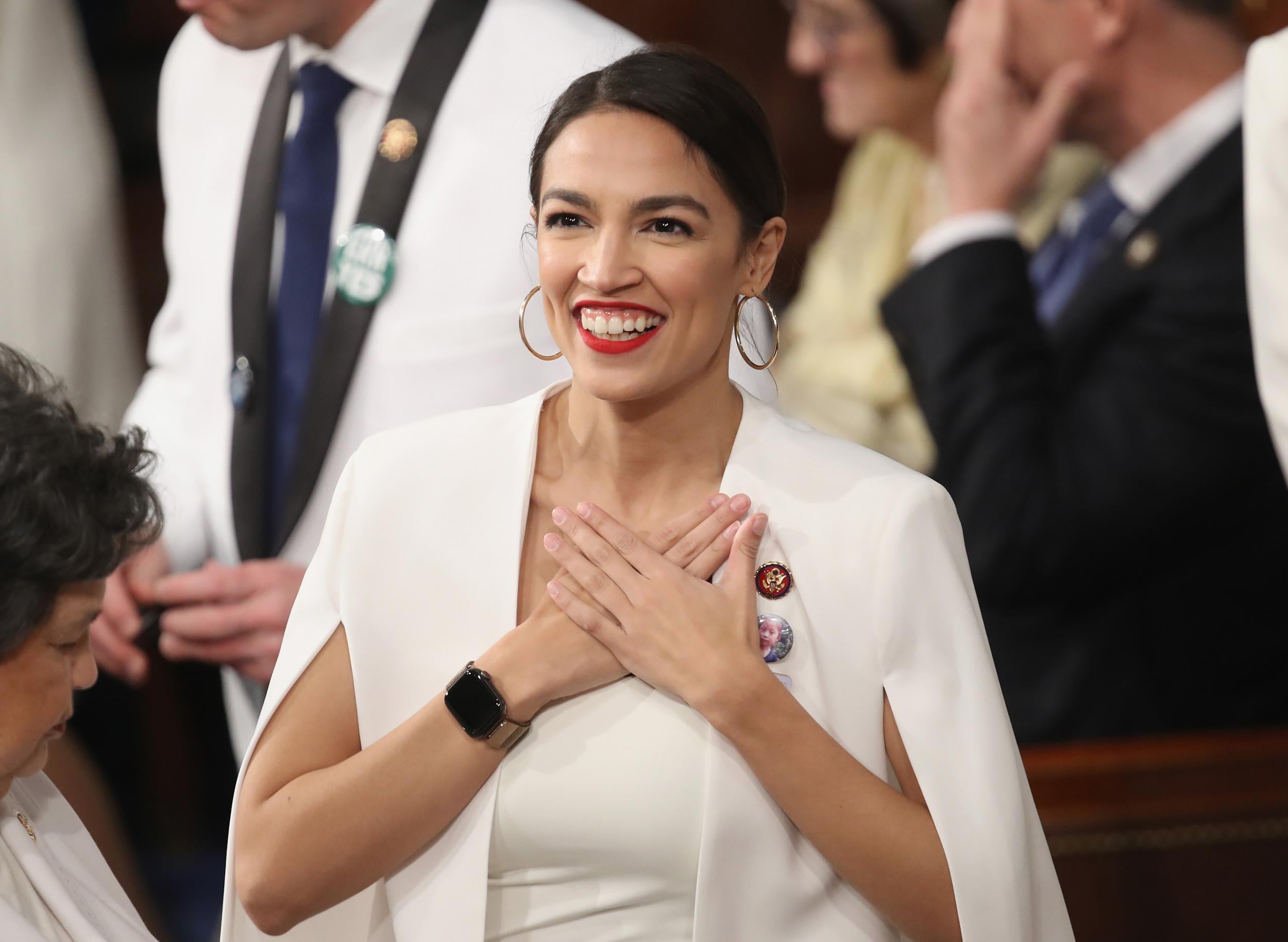 U.S. Rep. Alexandria Ocasio-Cortez (D-NY) greets fellow lawmakers ahead of the State of the Union address in the chamber of the U.S. House of Representatives on February 5, 2019 in Washington