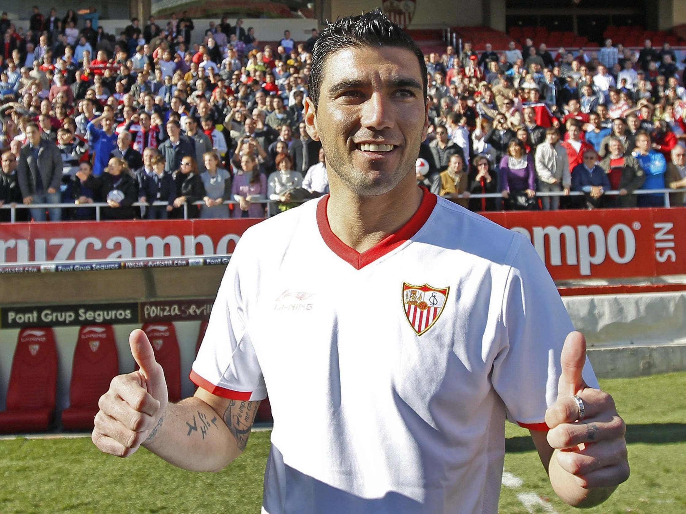 Reyes in Sevilla colours in January 2012: he first joined the club as a precocious 10-year-old