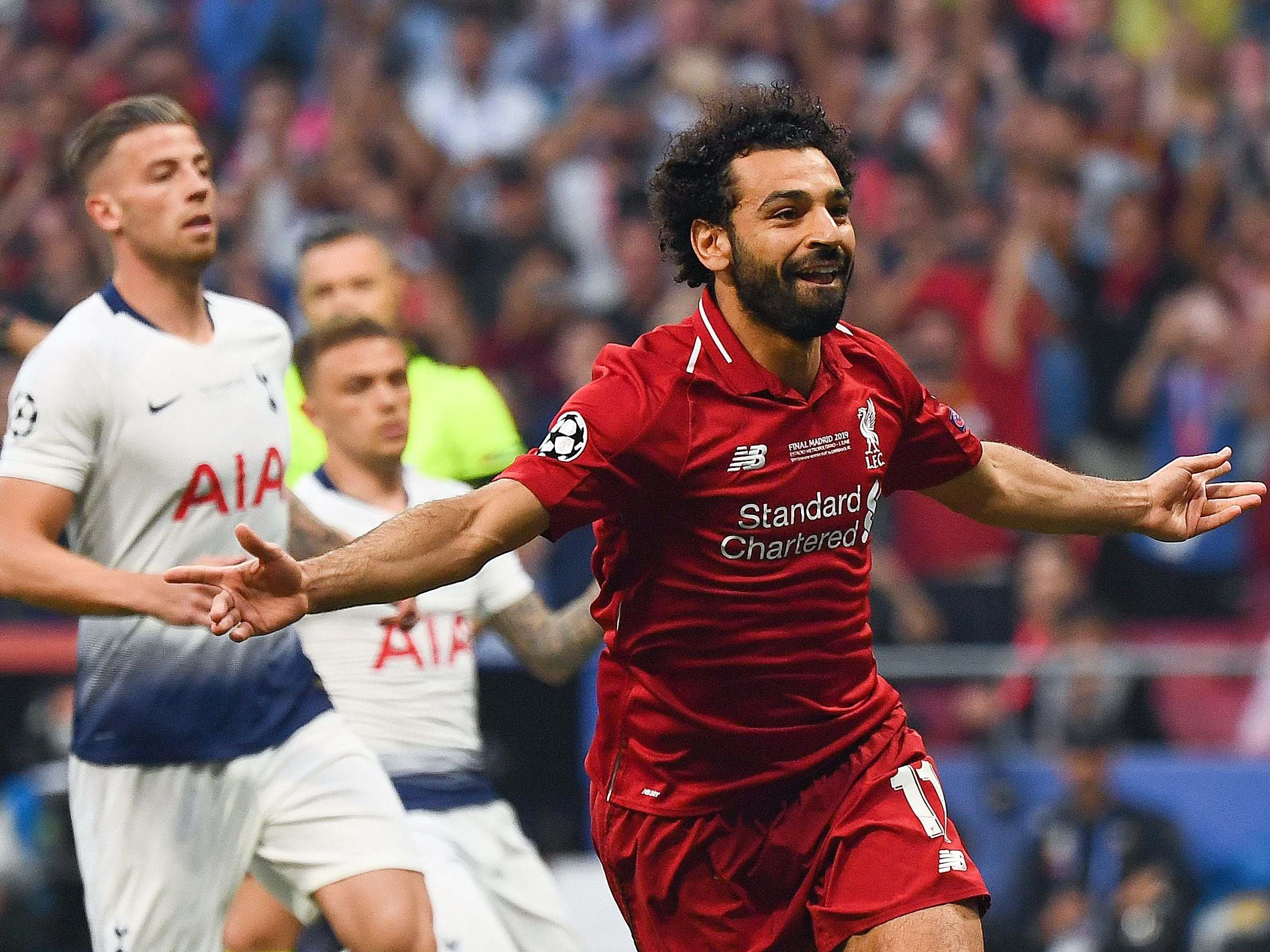 Salah celebrates after scoring from the spot (AFP/Getty)