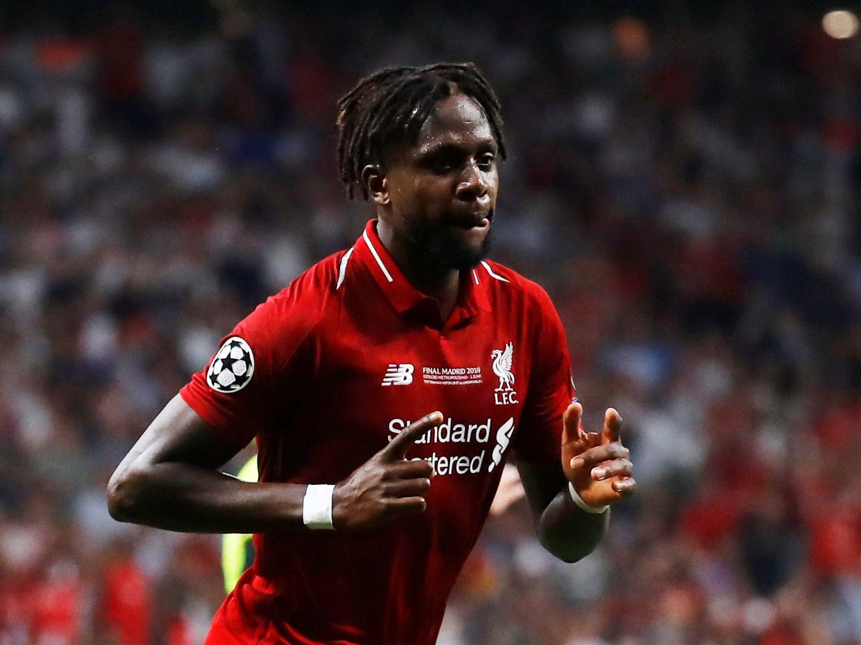 Origi celebrates scoring Liverpool’s second